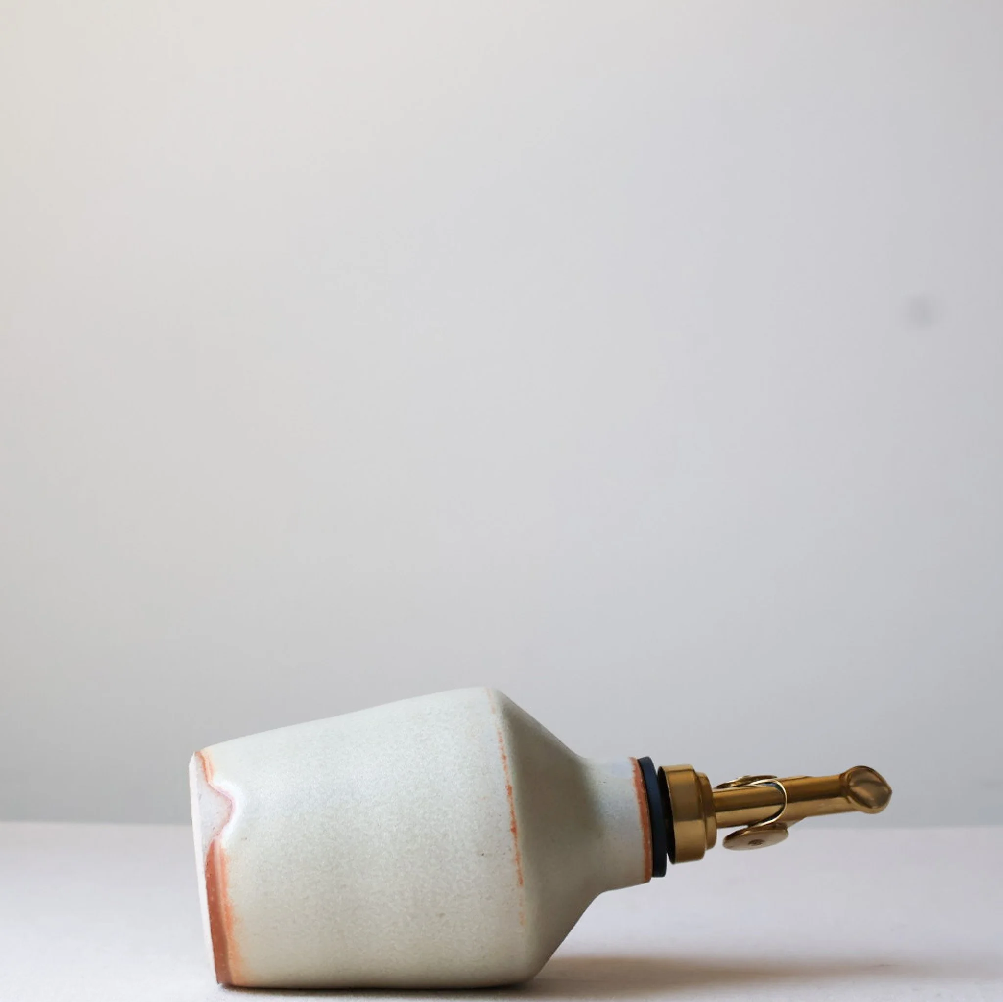 metallic-cream-oil-bottle-3.jpg