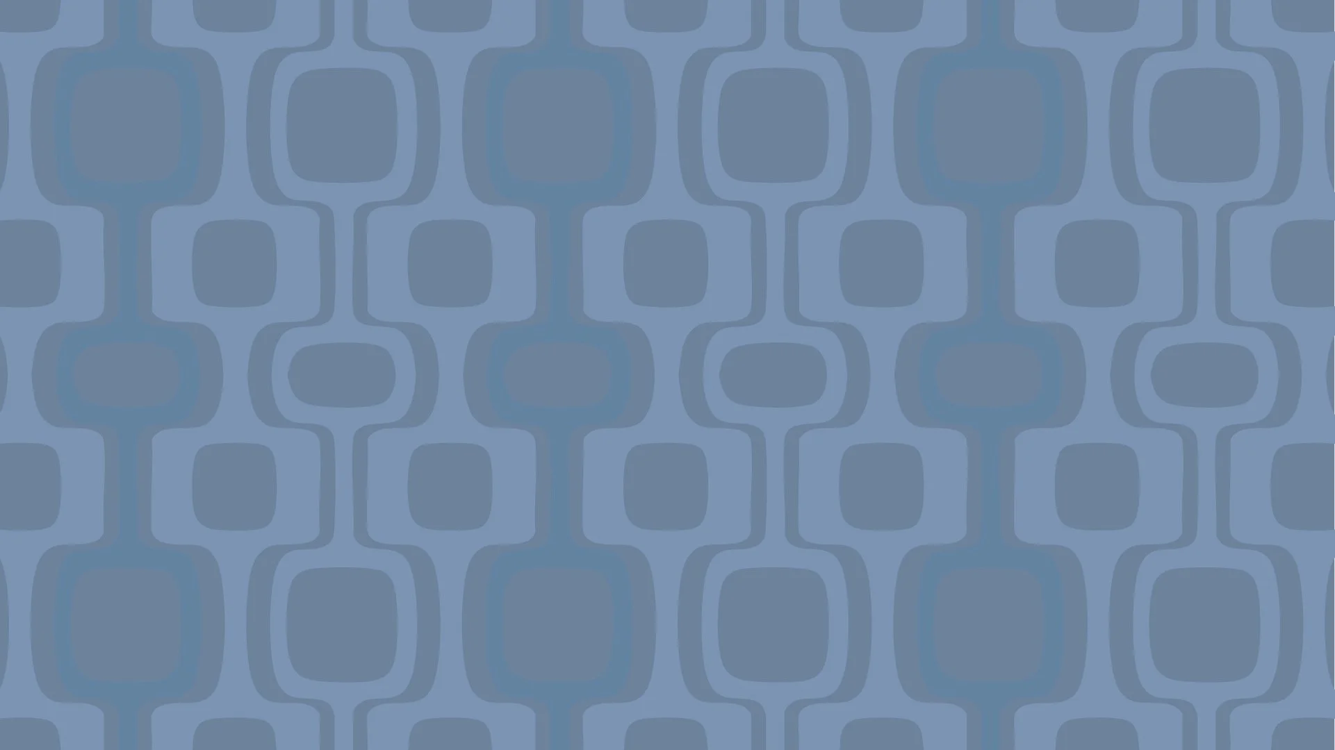 Pattern of interlocking blue shapes with rounded edges.