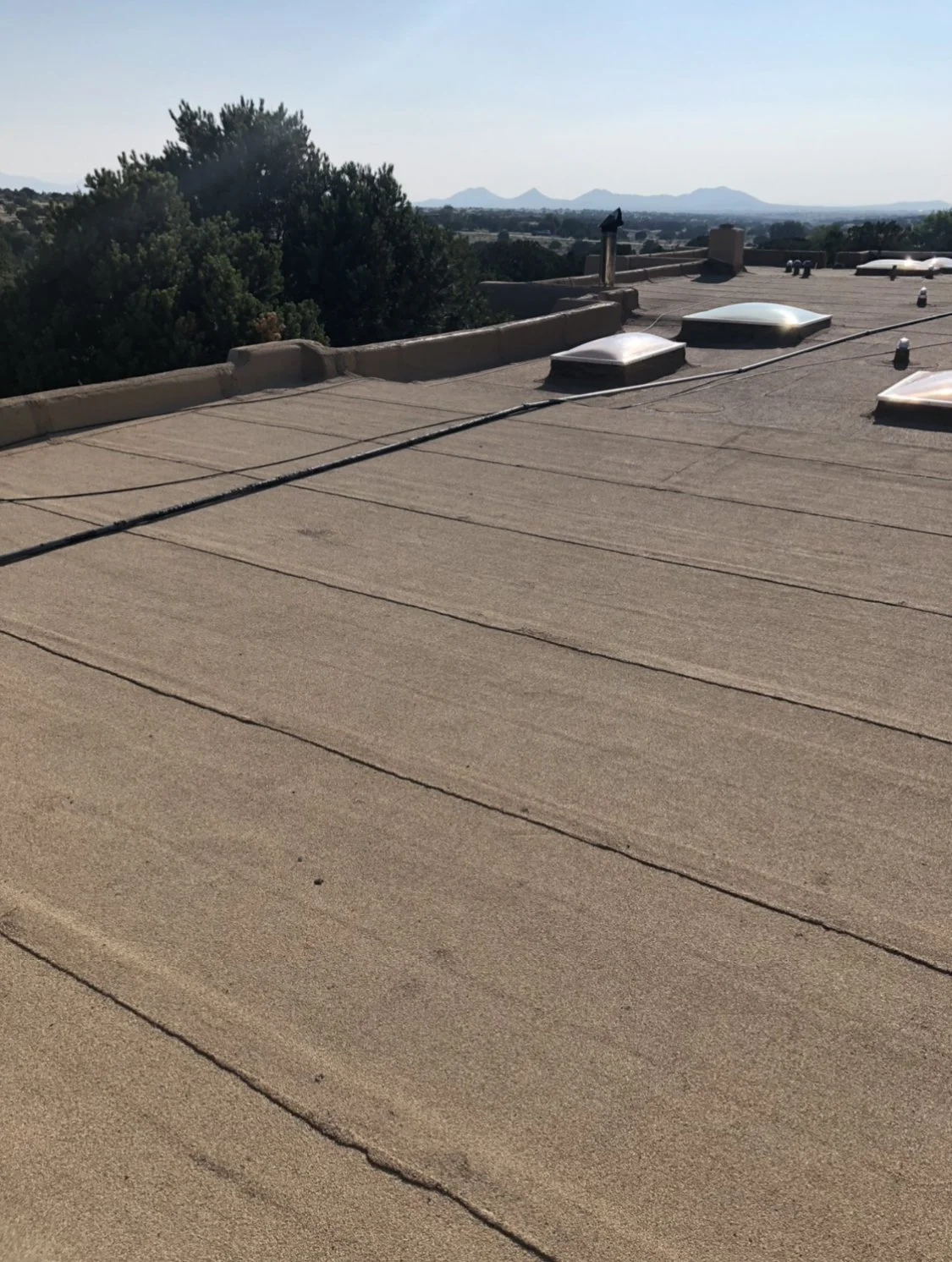 New roof surface overlooking the Santa Fe foothills