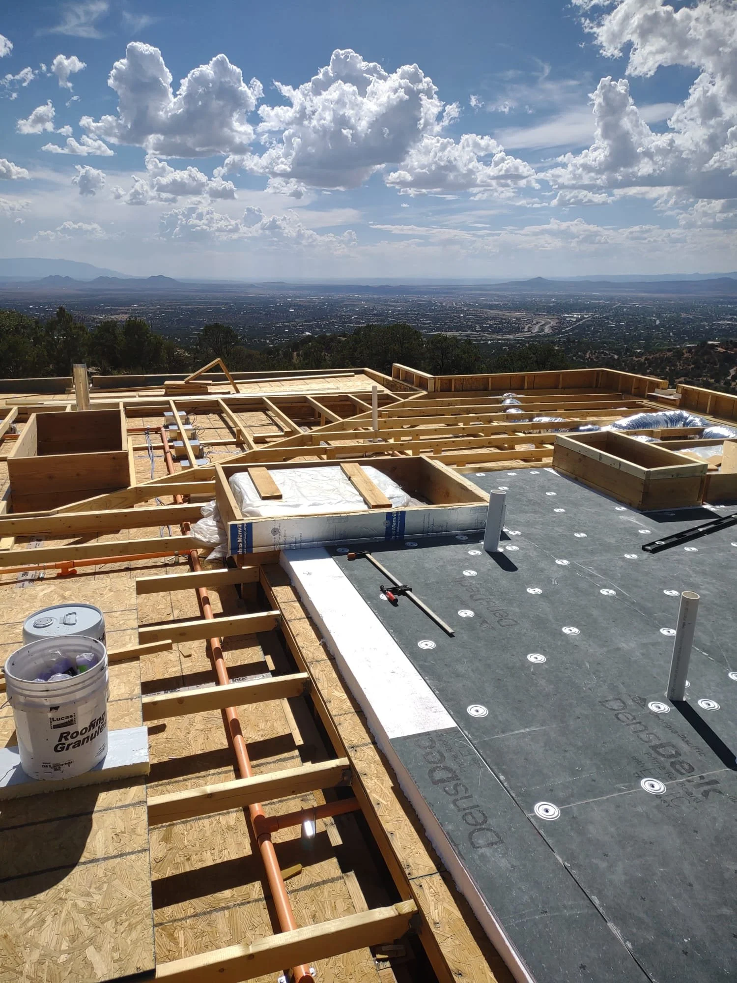 New roof built from the deck up, overlooking Santa Fe