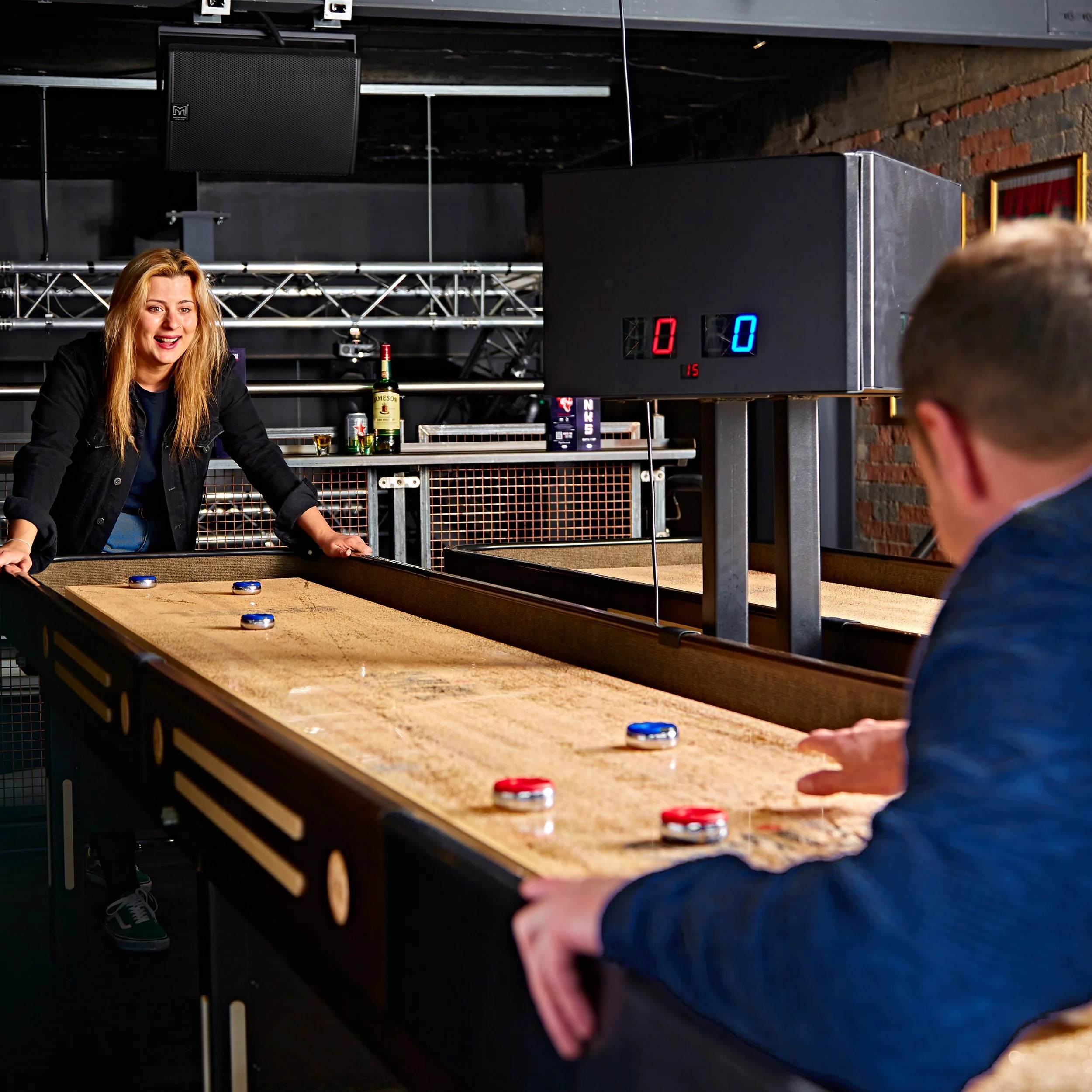 Play Shuffleboard in Newcastle — MOJO Bar