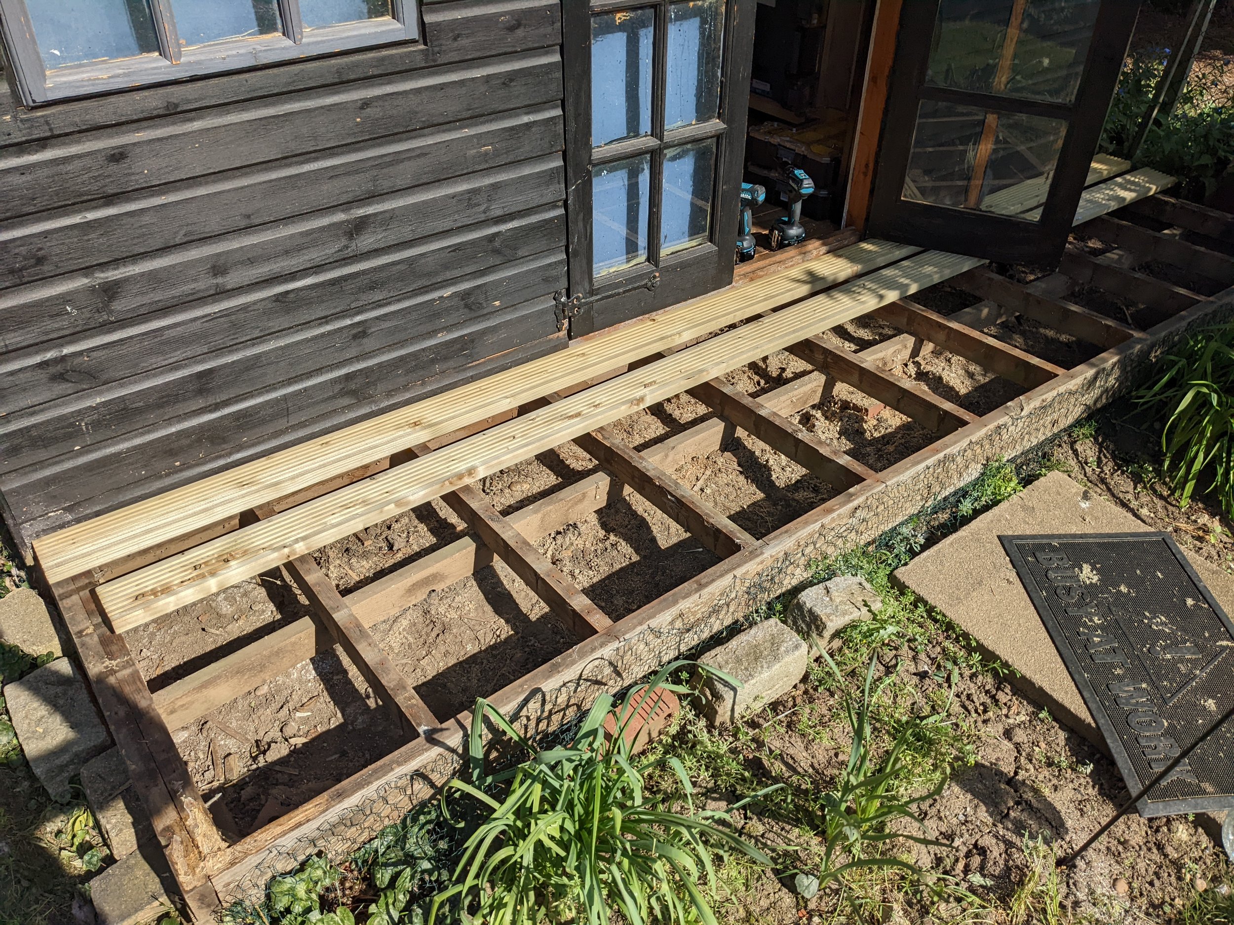 The old decking removed. However, I kept the structure as I was on a budget at the time. It still holds fine.