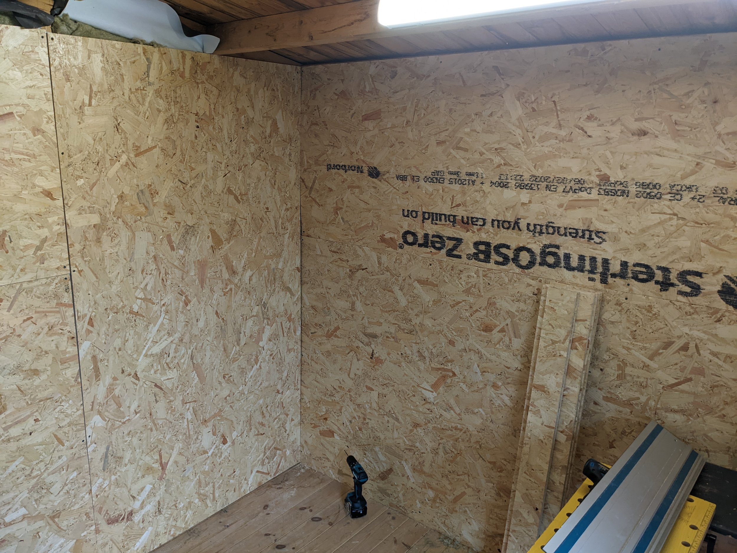 All walls are then individually walled with 12mm OSB. Been reccomended 18mm but to keep costs down, it's surprisingly worked well!