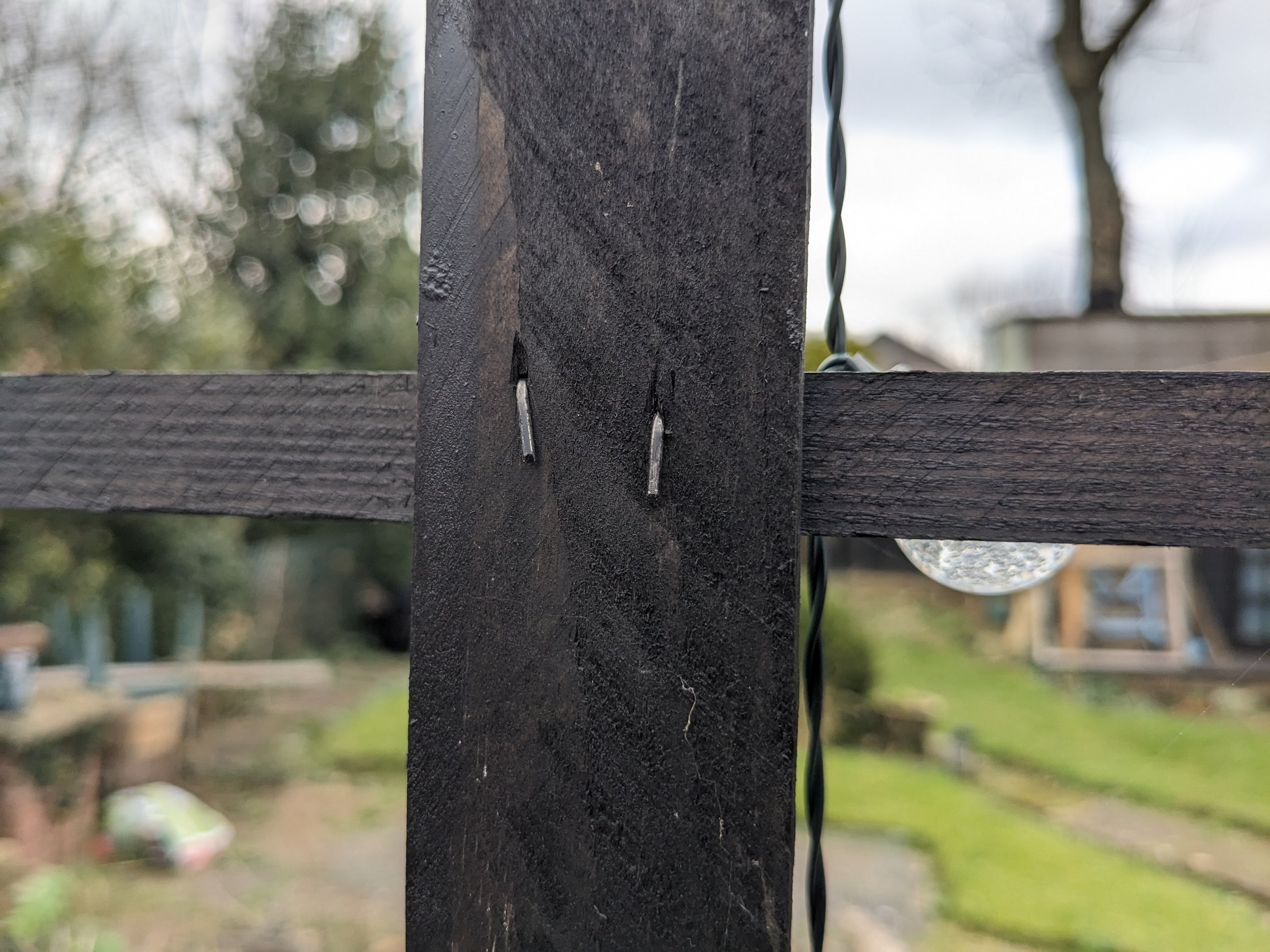 The brad nailer I used at the time only had long nails or failed to pierce all the way through. This is no problem as bending the nails over provided more strength