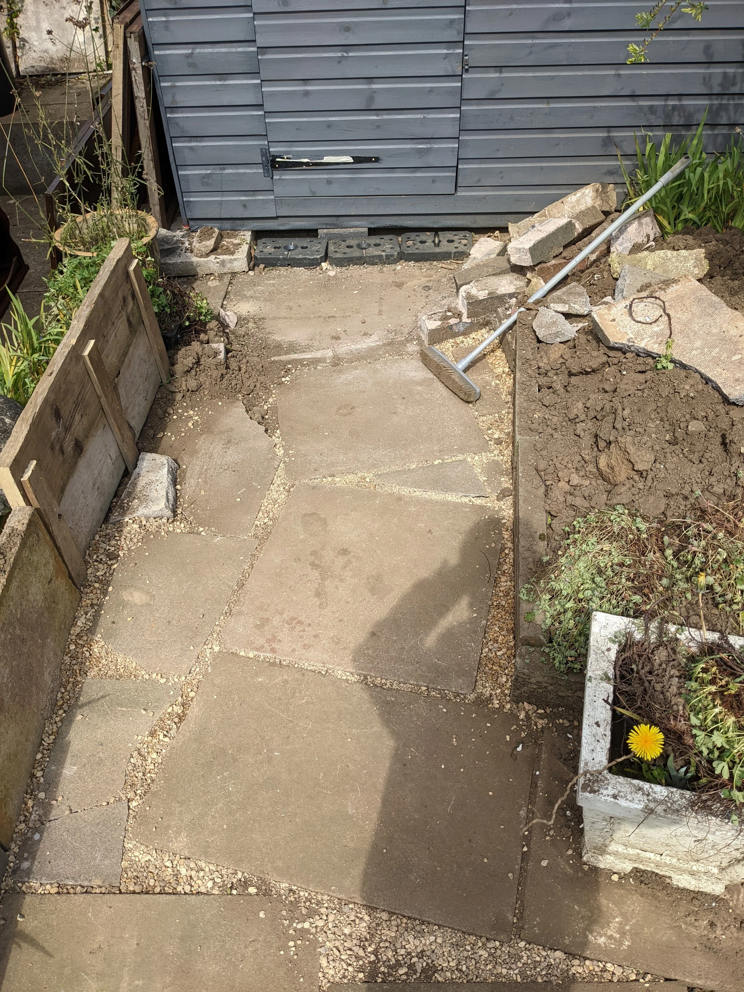 The path that leads to the shed. There is a brick in the way that I considered a trip hazard, but we deal with that in the next image.
