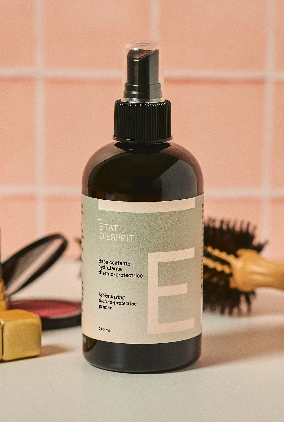 Base coiffante hydratante thermo-protectrice État d'esprit, comme du maquillage pour les cheveux.