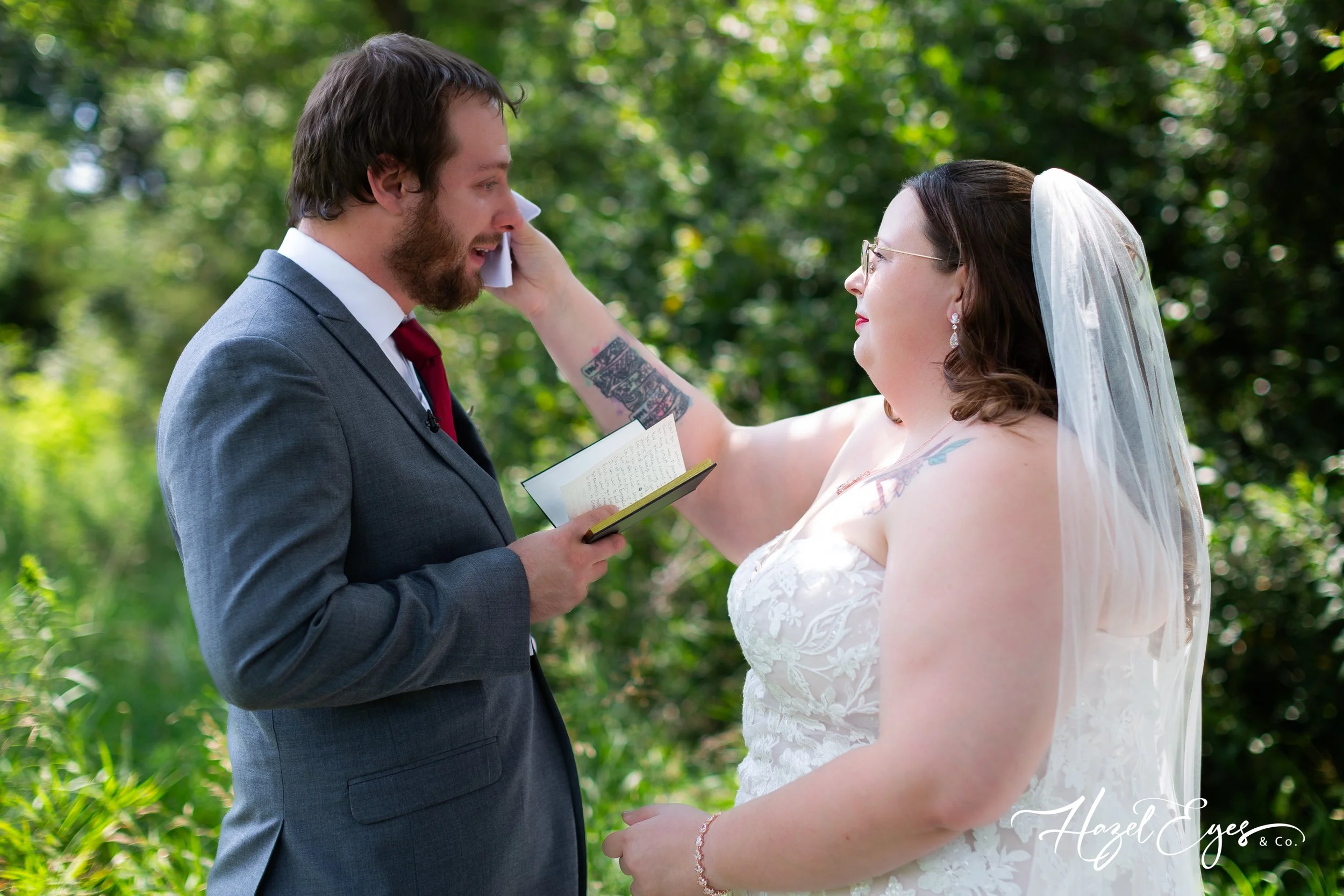 Michigan outdoor wedding. bride and groom photo. bride dress. groom suit. bride’s dress. Michigan wedding photographer. Hazel Eyes & Co. August wedding. Summer wedding.  Creekside Acres Event Barn Goodrich, MI 48438 Private vows