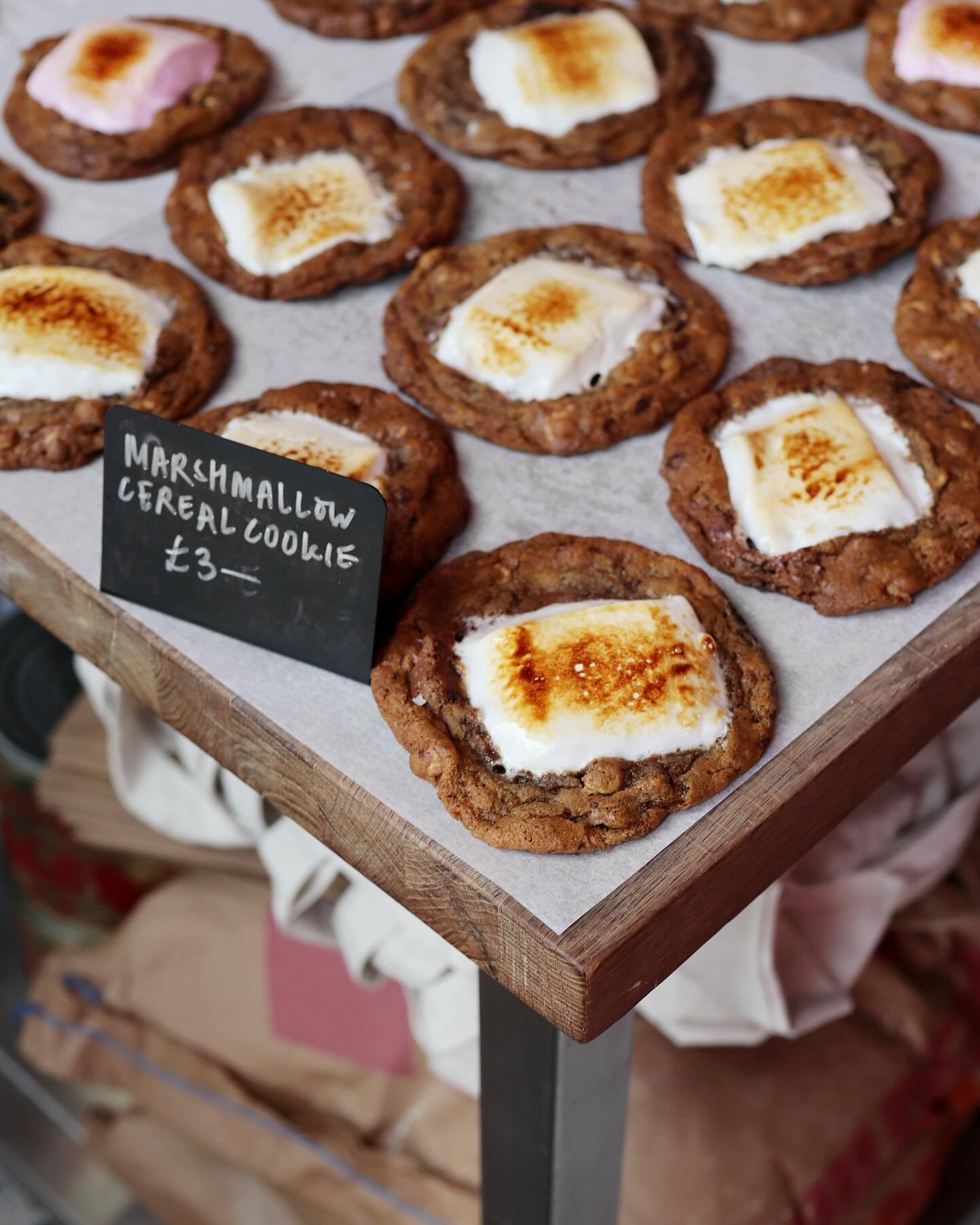 Saturday morning @chatsworthbakehouse aka the hotbox.
⭐️ Marshmallow cereal cookies
⭐️ Piling on the cheese on the courgette galettes
⭐️ Fresh loaves from the oven 
⭐️ Maritozzi being filled with the most amazing malted milk cream