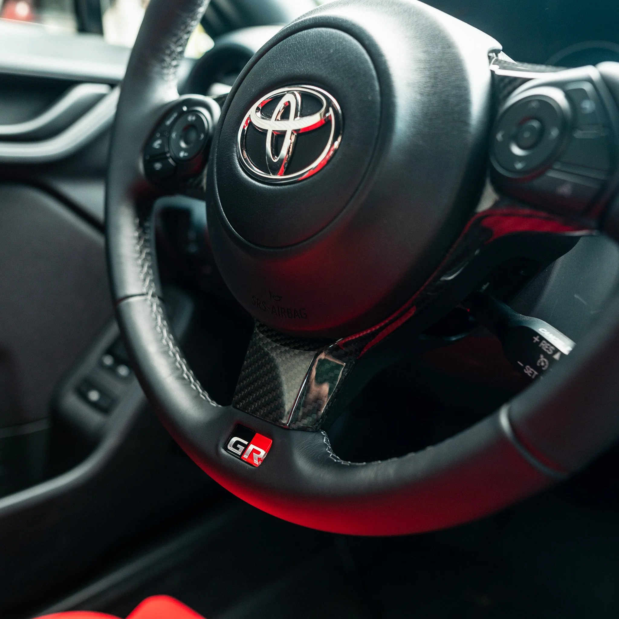22+ GR86/BRZ Carbon Fiber Steering Wheel Trim — driven.media