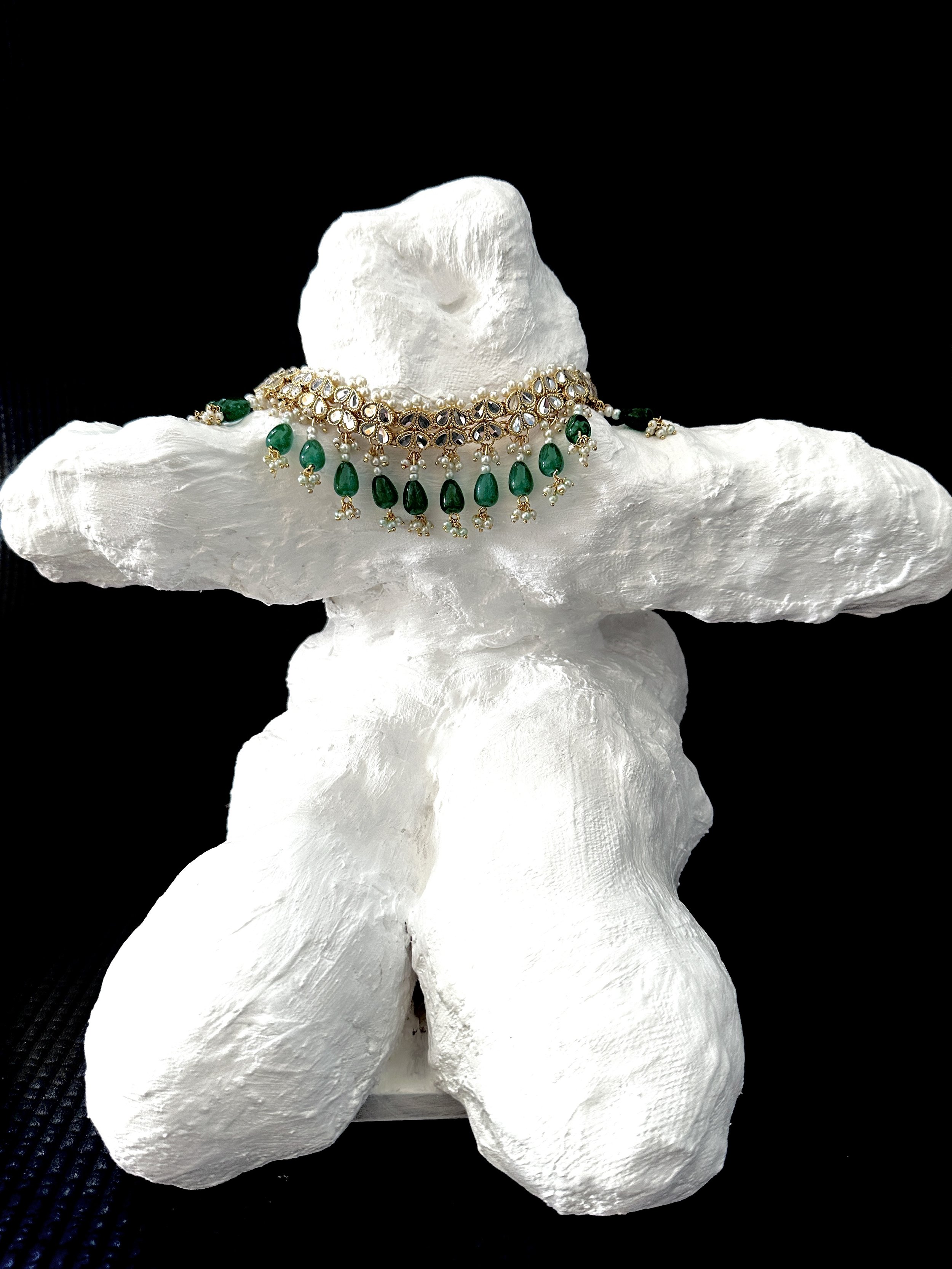 Bride | 27.5 x 35.2 x 30.2 cm | Plaster, Polyurethane, Acrylic, Necklace, Wood base.