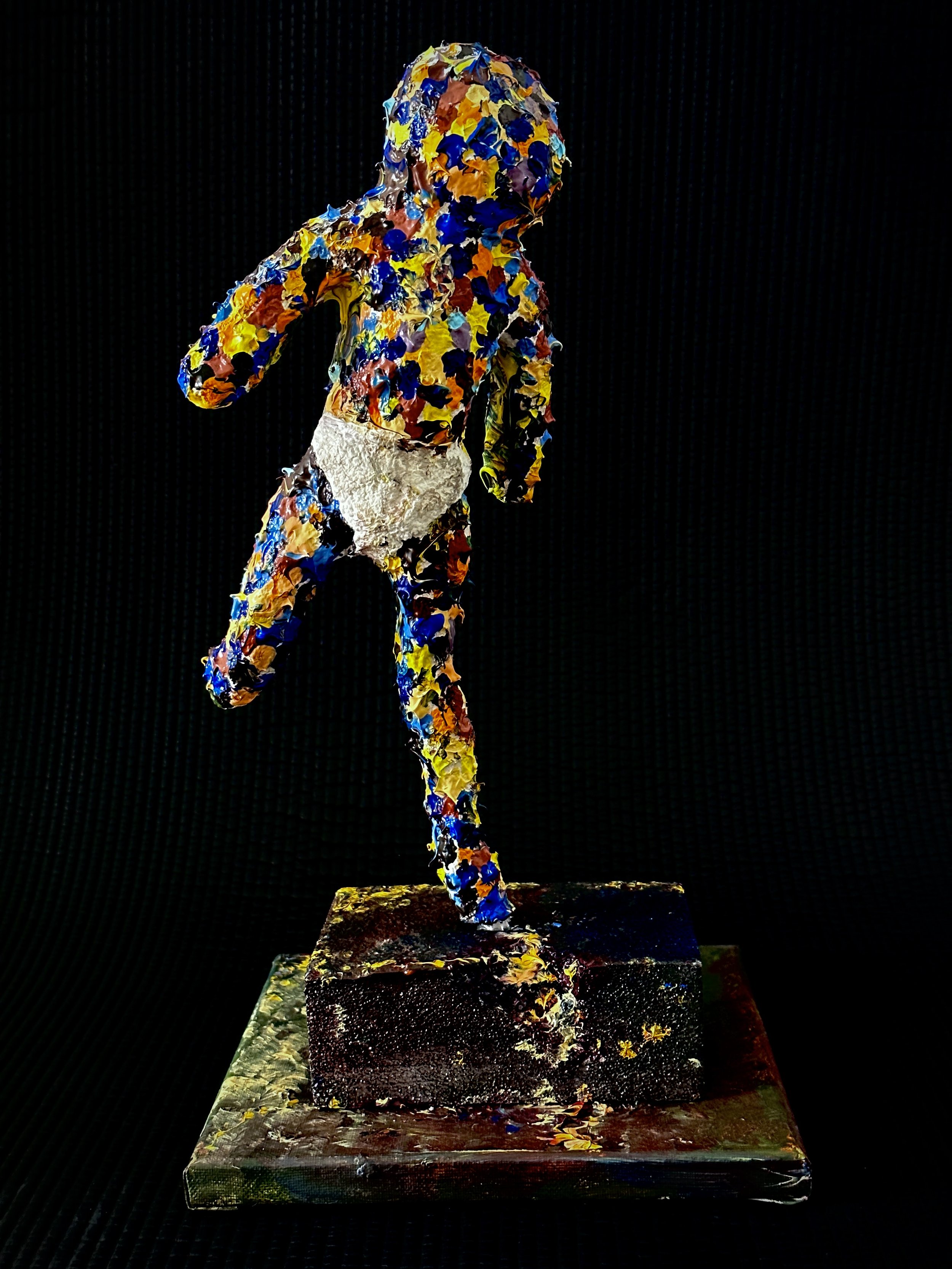Molten | 38.1 x 20 x 20 cm | Paper Mache, Acrylic, and Wood base.