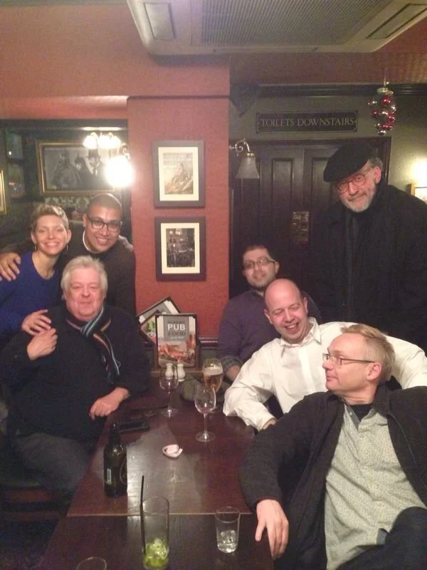 Simon Bainbridge with composers Tansy Davies, Gary Carpenter, Daniel Kidane, Mahan Esfahani, Huw Edwards and Rolf Wallin