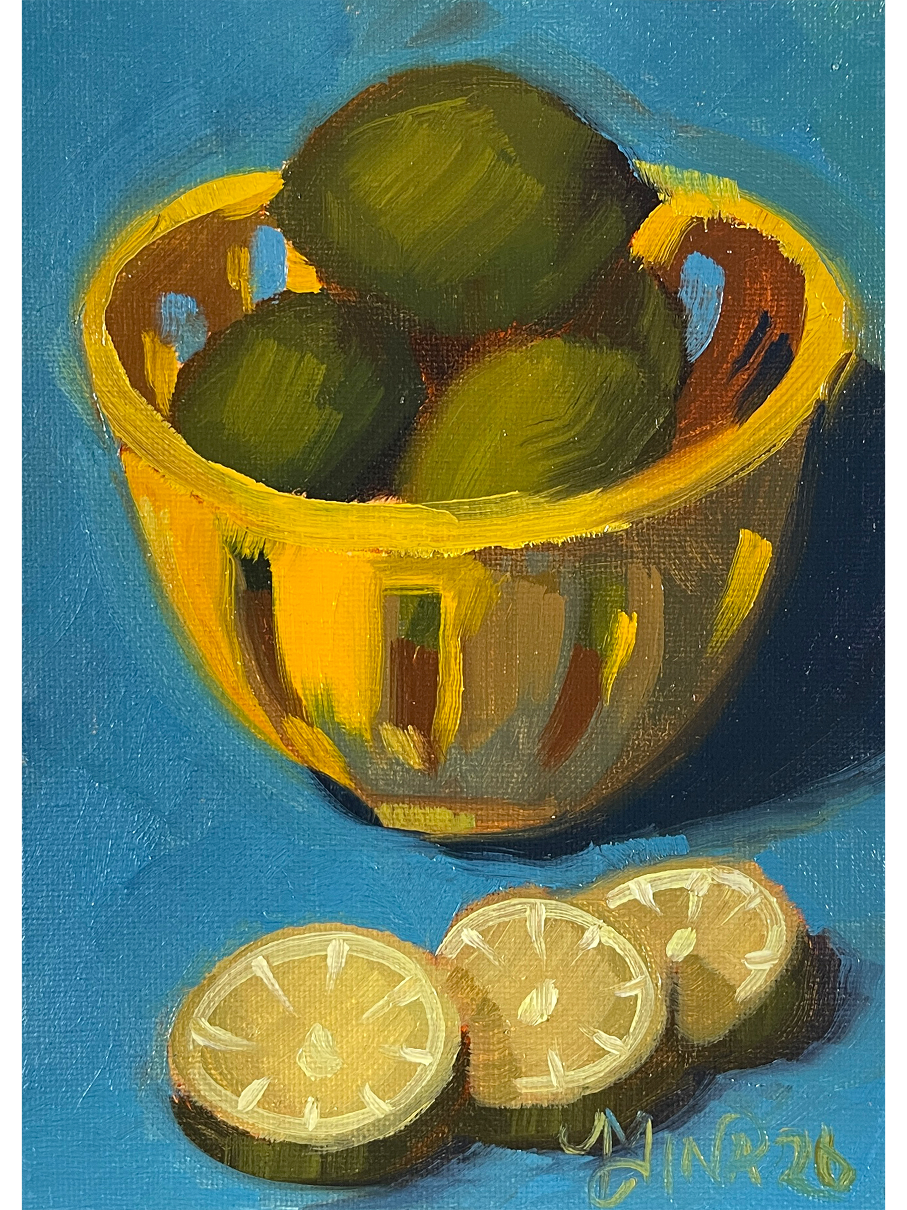 Limes in a Yellow Bowl