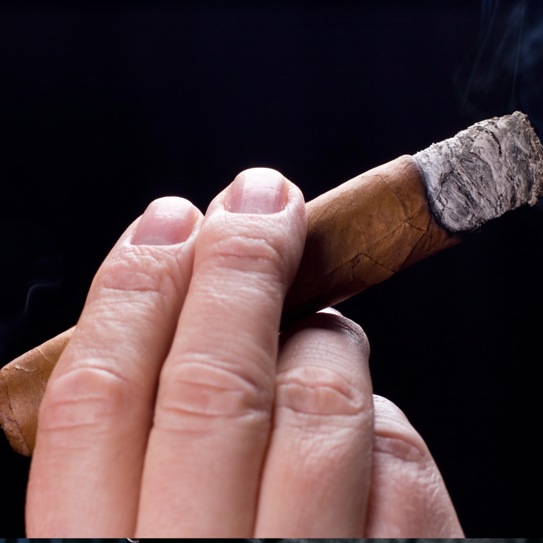How to Hold a Cigar Like a Gentleman: Mastering Technique, Etiquette & Style
