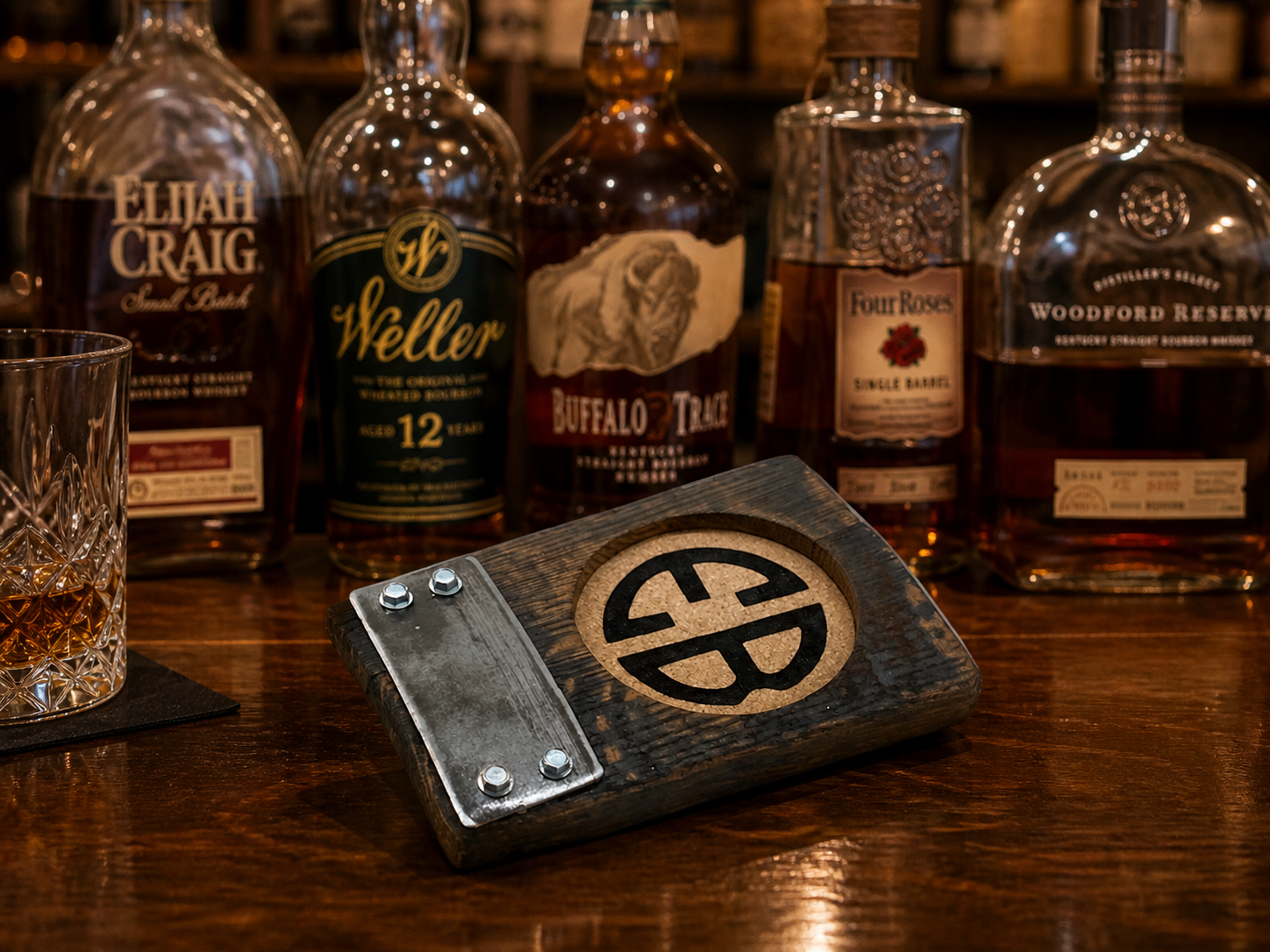 Custom engraved whiskey barrel wood coaster featuring reclaimed oak stave, laser-etched initials, and industrial metal detail for a unique bourbon gift.