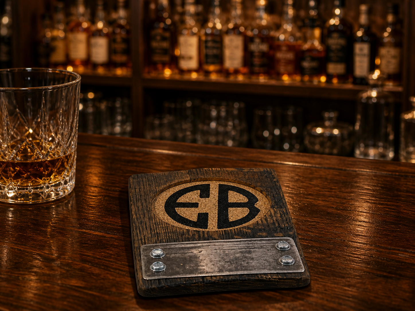 Handcrafted bourbon barrel coaster with personalized cork insert and charred oak finish, ideal for whiskey enthusiasts and rustic bar accessories.