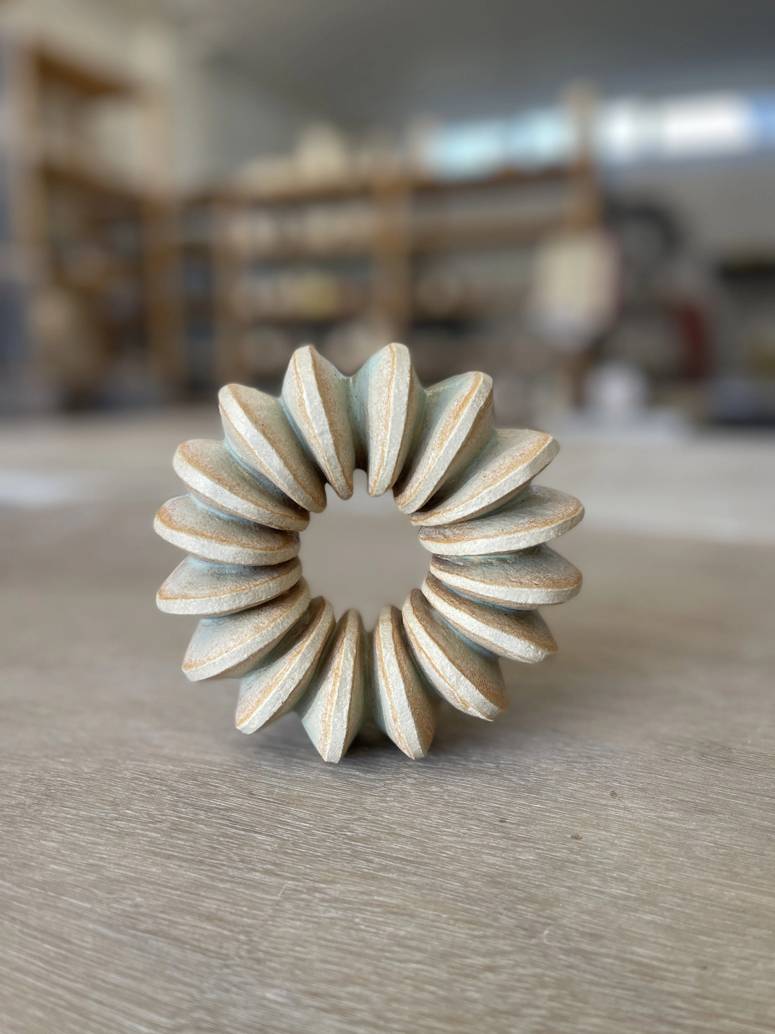 Look closely and you'll see the tones of copper patina in the carved insets of Diana's beautiful sculpture.  A very quick dip wiped gently away on the edges.