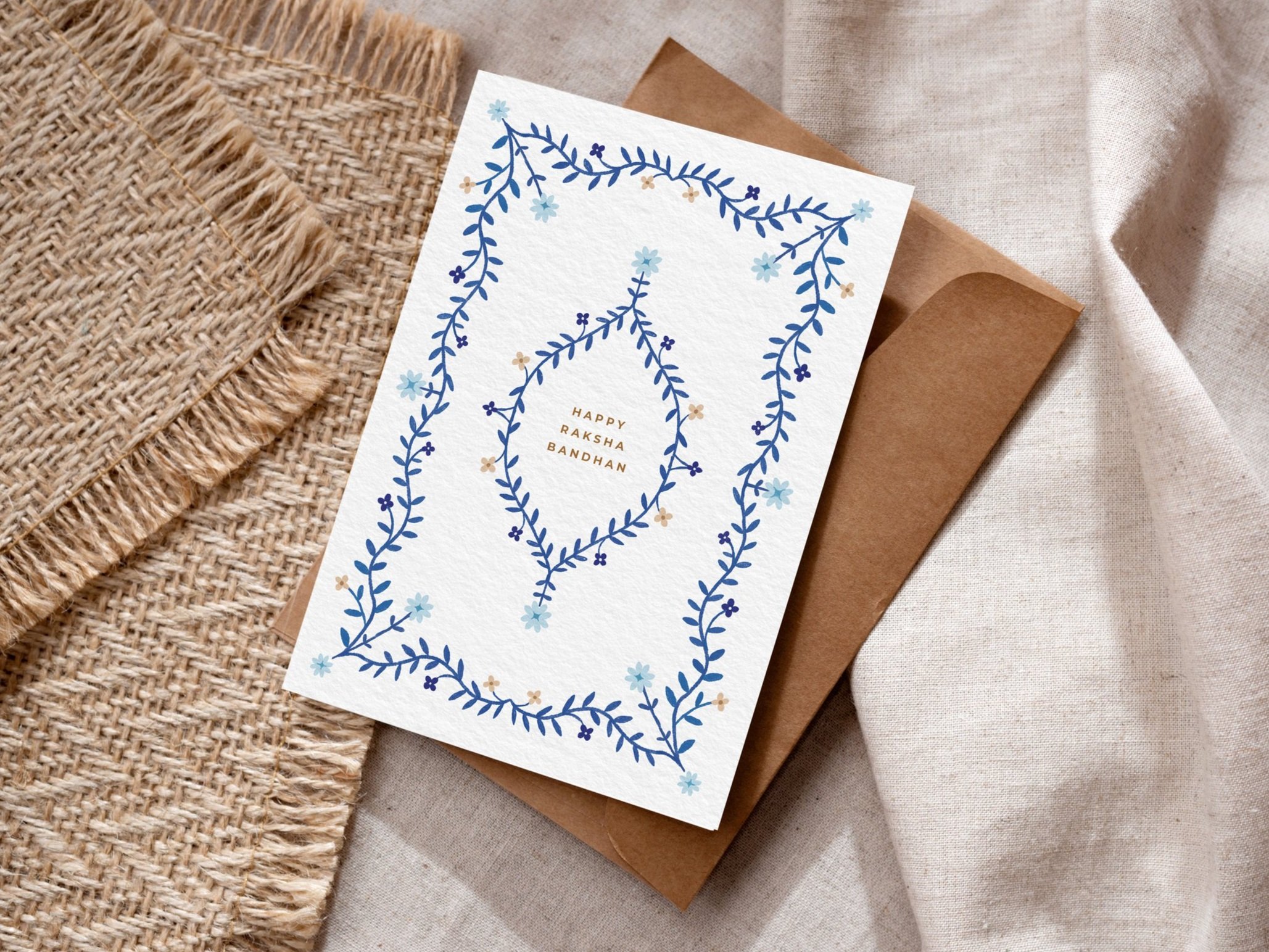 Rakhri+2024_Blue+Floral+Border+5x7+Card_HMv1.jpg