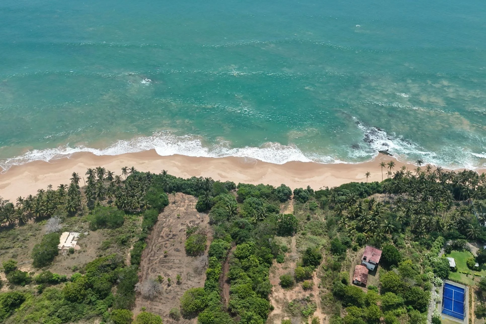 An aerial image of beautiful beachfront land for sale in Southern Sri Lanka