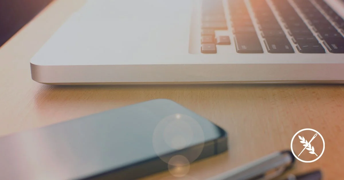 laptop and phone on table