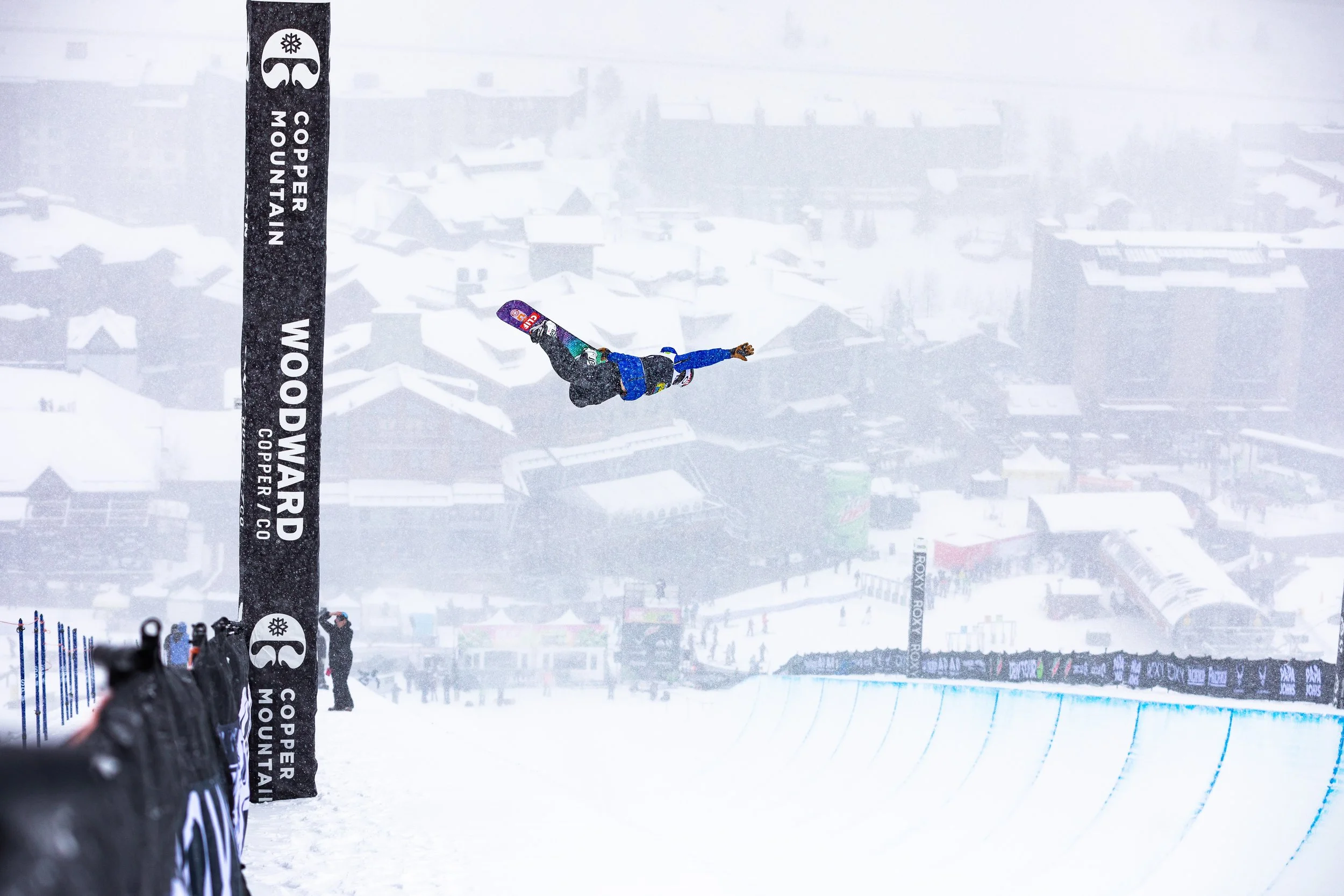 Taylor Gold holding a method air in the halfpipe at Dew Tour at Copper Mountain in Colorado. Photographed by Tyler Baker from Tyler Baker Photo.