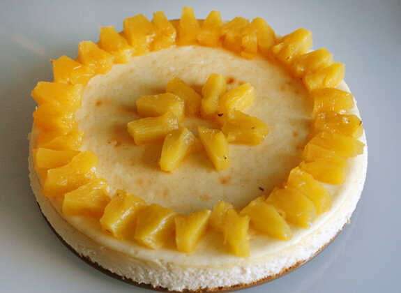 Crème fraîche cheesecake with honey-rum-roasted pineapple