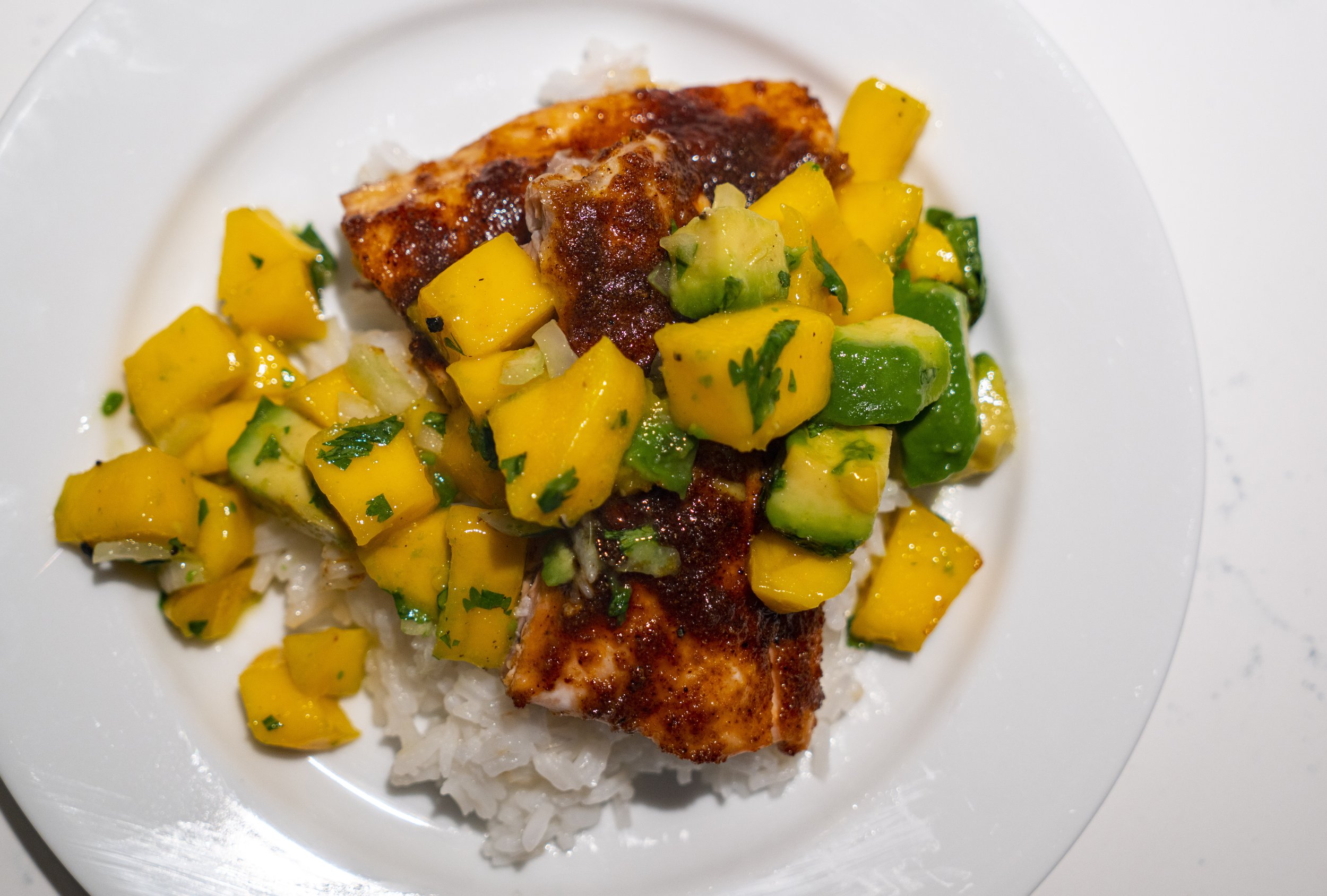 Salmon bowls with mango avocado salsa