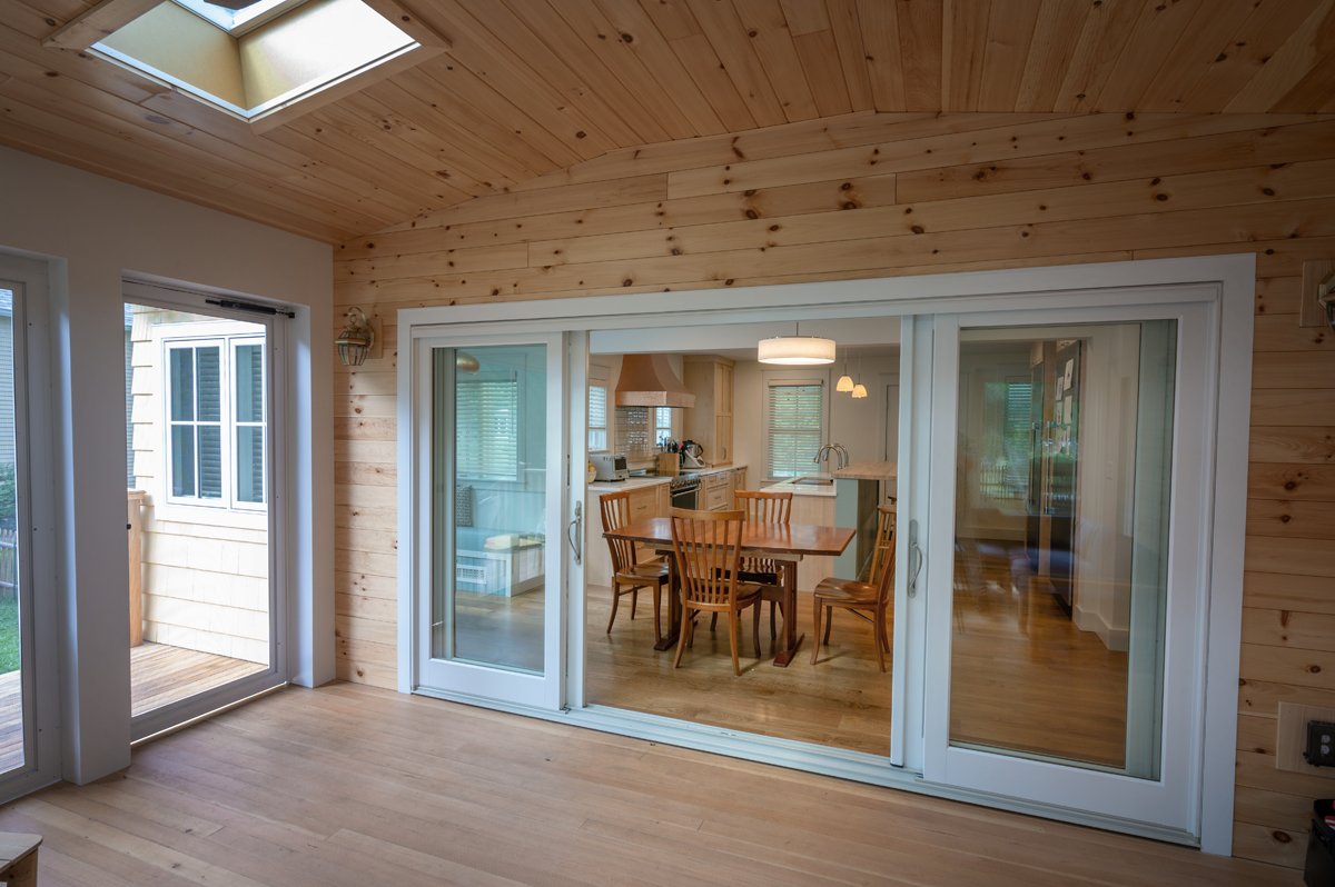 AFTER: sunroom + kitchen looking west