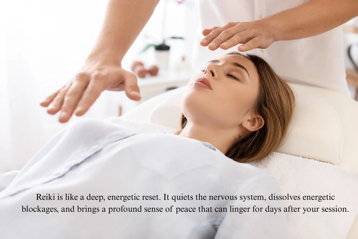 Reiki energy healing session with hands placed above the body for relaxation and stress relief