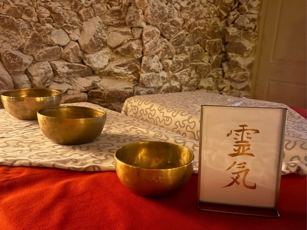 Reiki and sound healing singing bowls in salt cave meditation space in North Vancouver