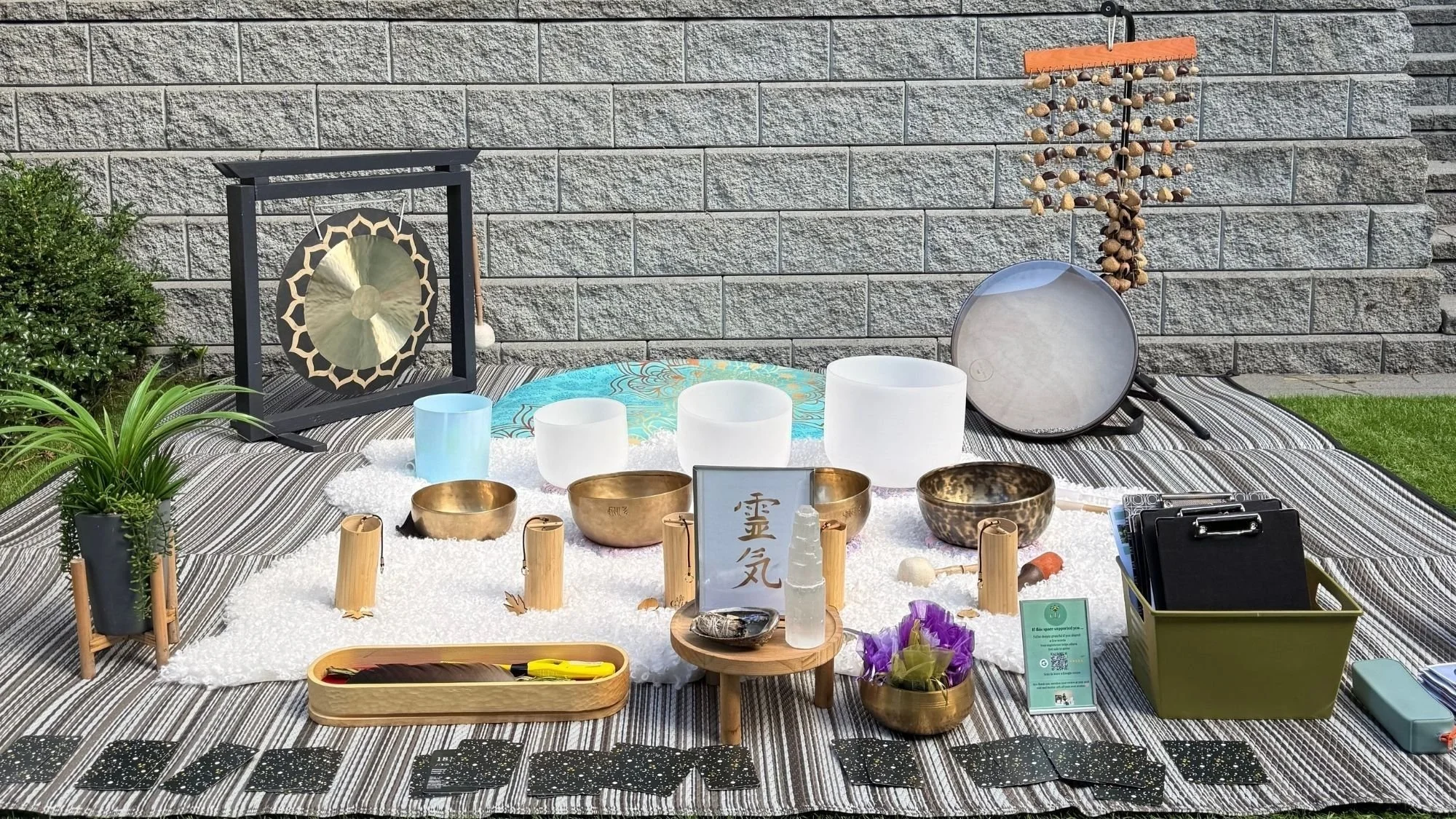 Crystal singing bowls, gong and Reiki setup for a private women’s retreat