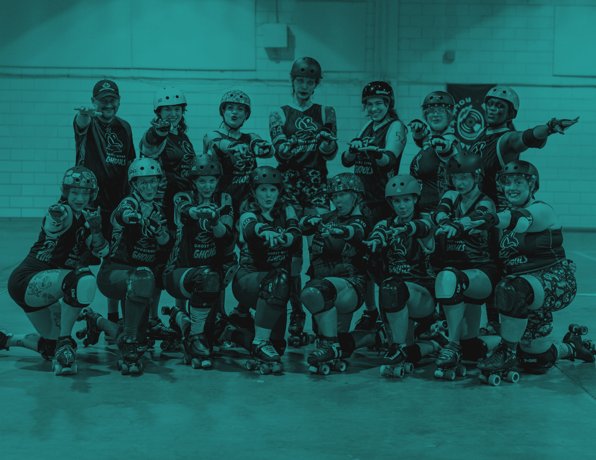 roller derby players pose for a group photo