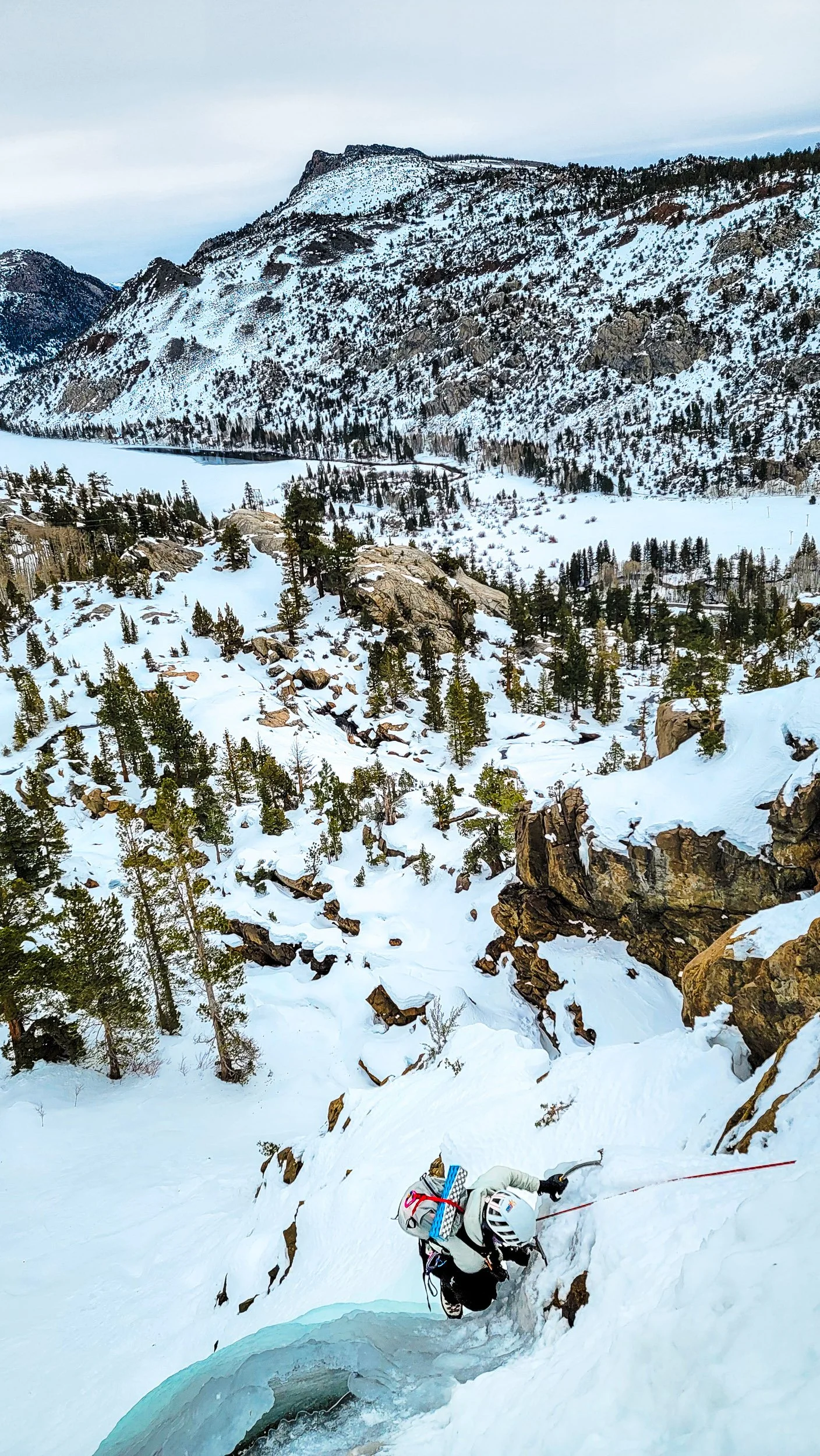 Evonne following up pitch 1 of North Gully, WI2+, in June Lake, California.  January 21, 2026.