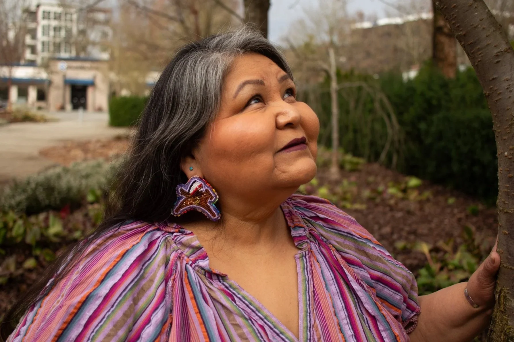 Elaine Miles smiles in Downtown Redmond Park.