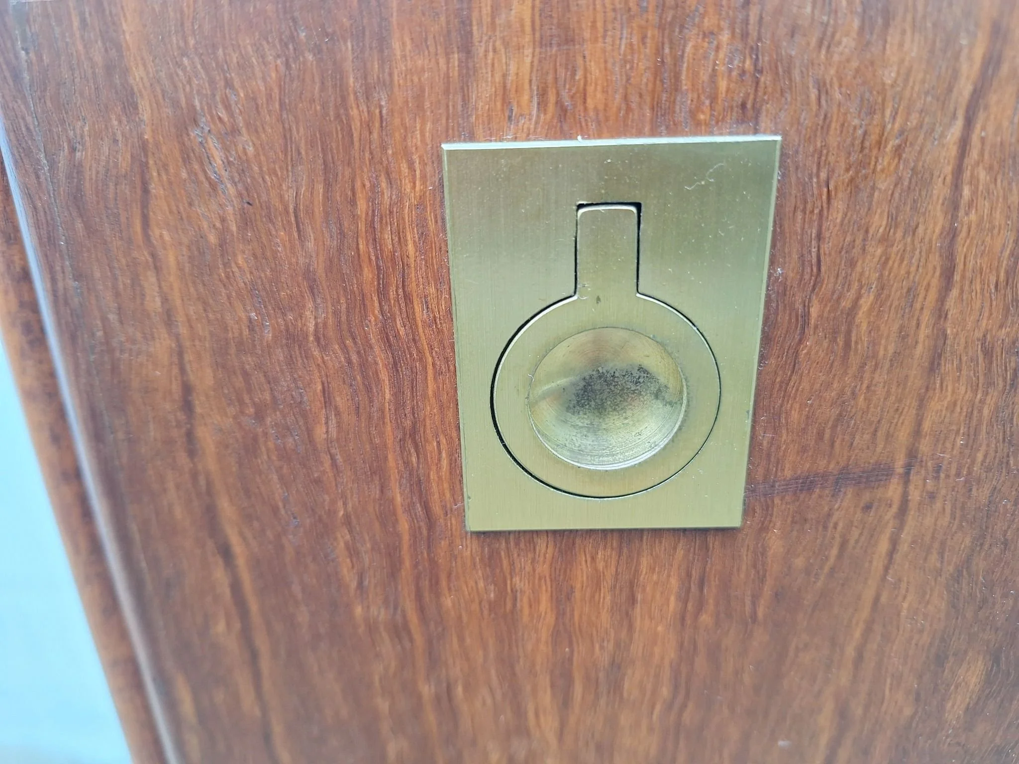 Recessed brass handle detail