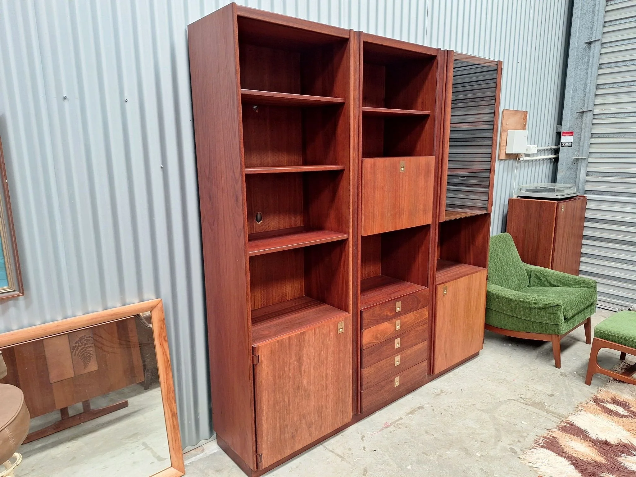 kush interiors mid-century teak wall unit angle