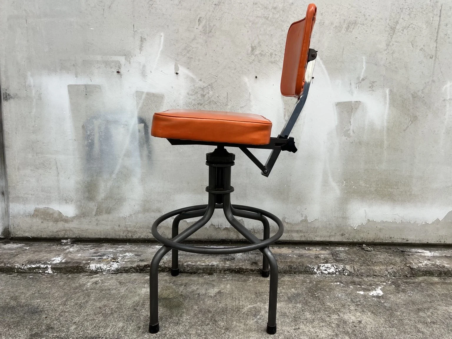 kush interiors industrial adjustable stool orange 03