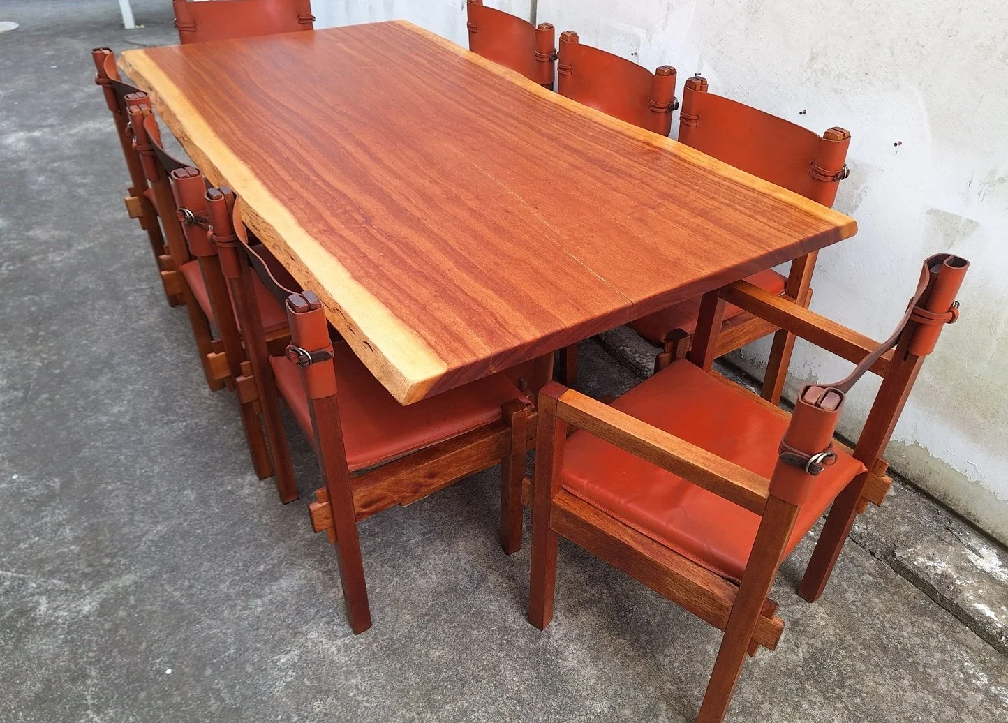 Eight Griffith Tablecraft leather and rosewood dining chairs with table