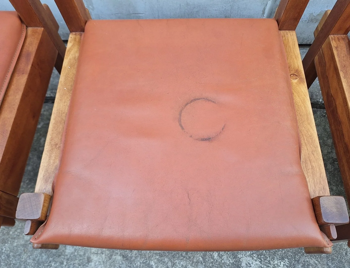 Original leather seat on Griffith Tablecraft dining chair showing vintage patina