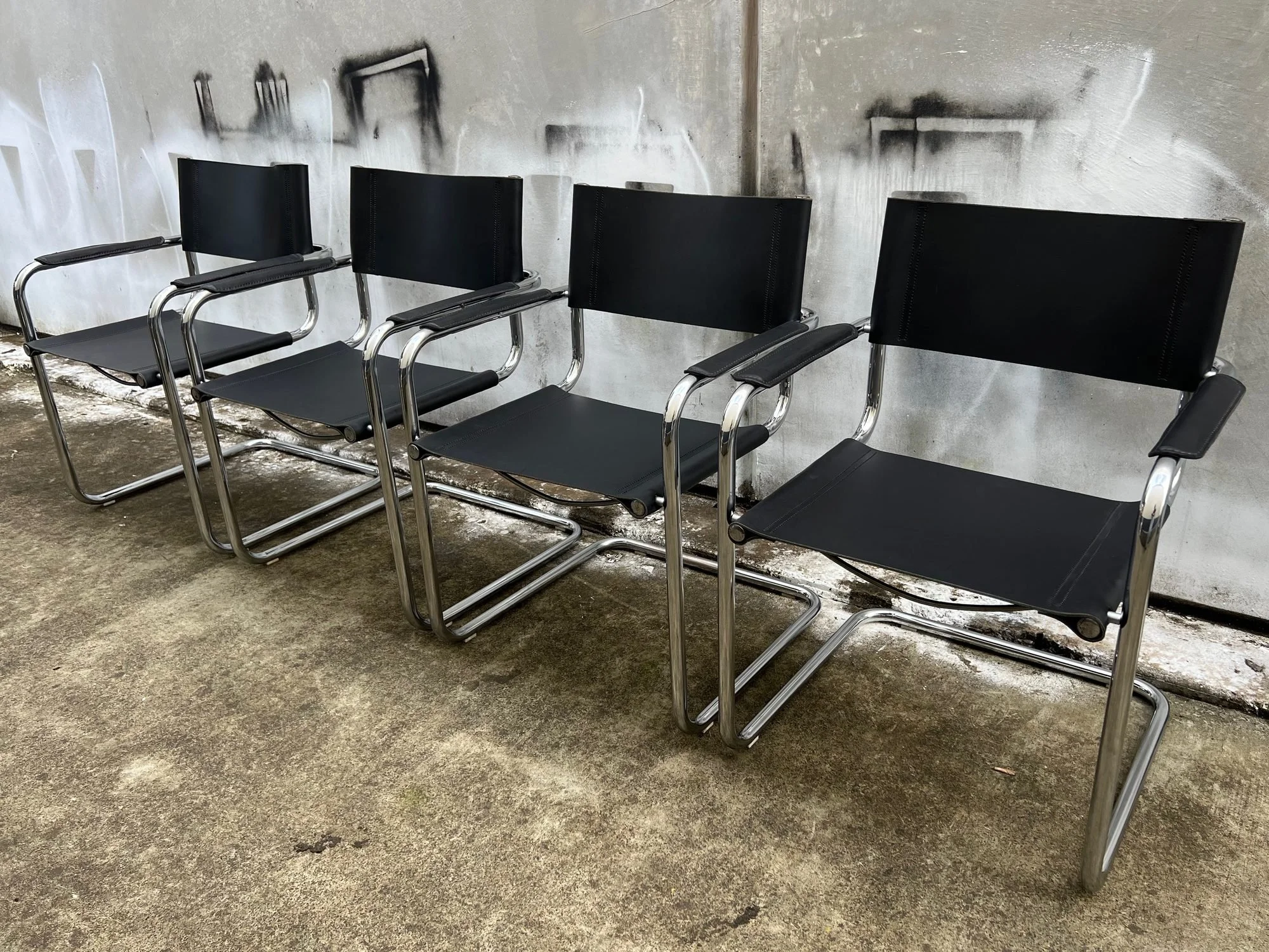 set-of-four-mart-stam-style-cantilever-leather-chairs-1.jpg