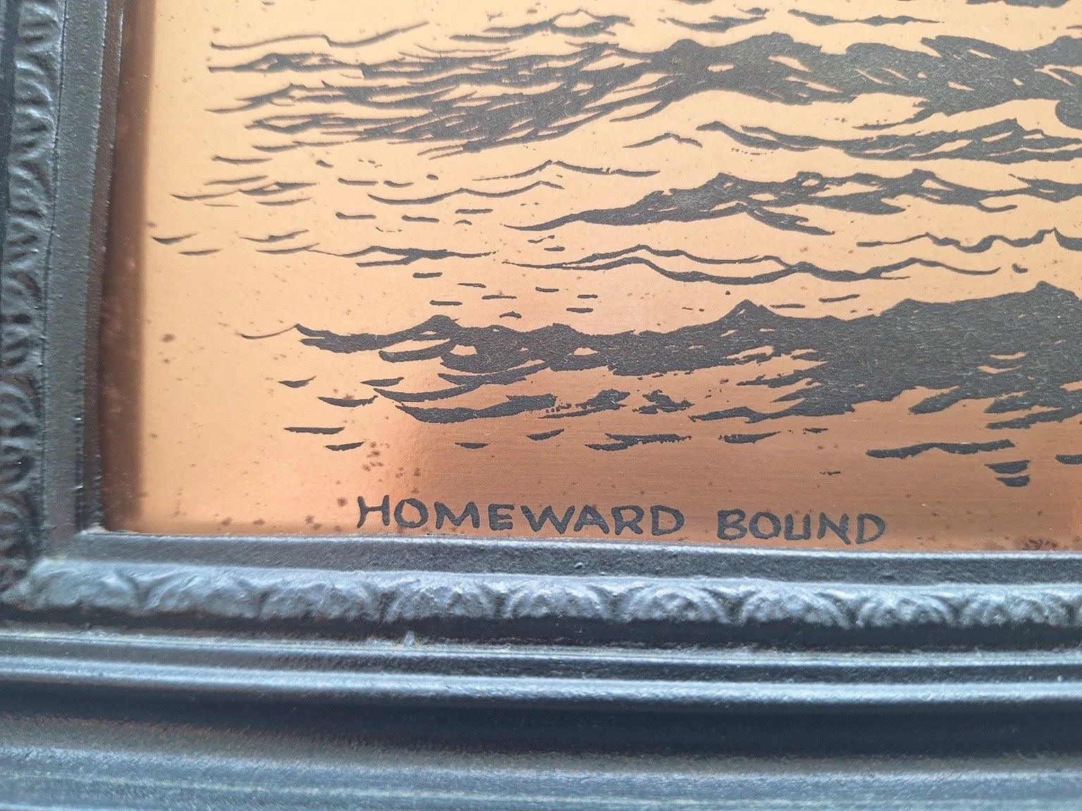 Homeward Bound title at the bottom of the copper panel with decorative frame detail.