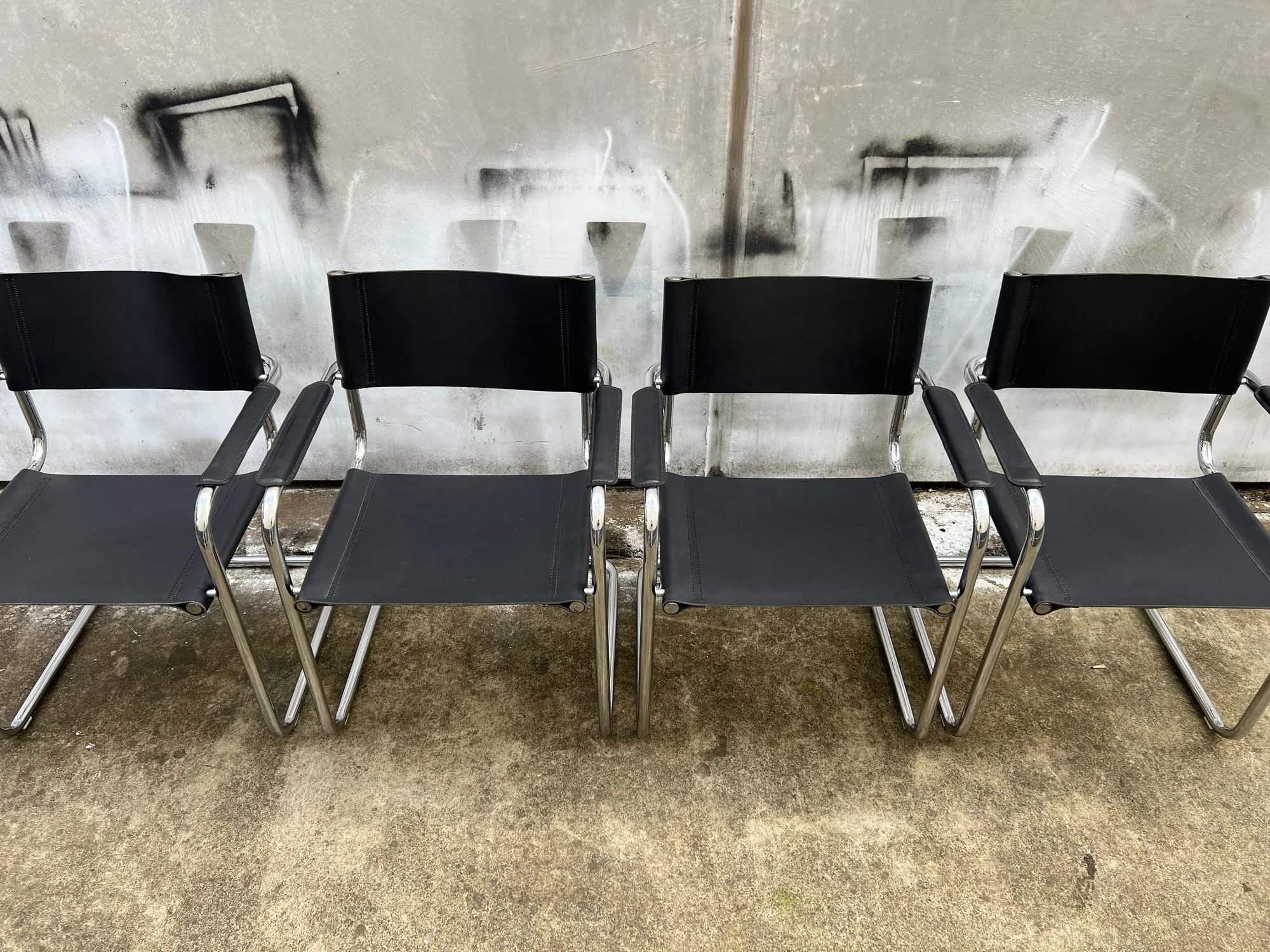 set-of-four-mart-stam-style-cantilever-leather-chairs-3.jpg