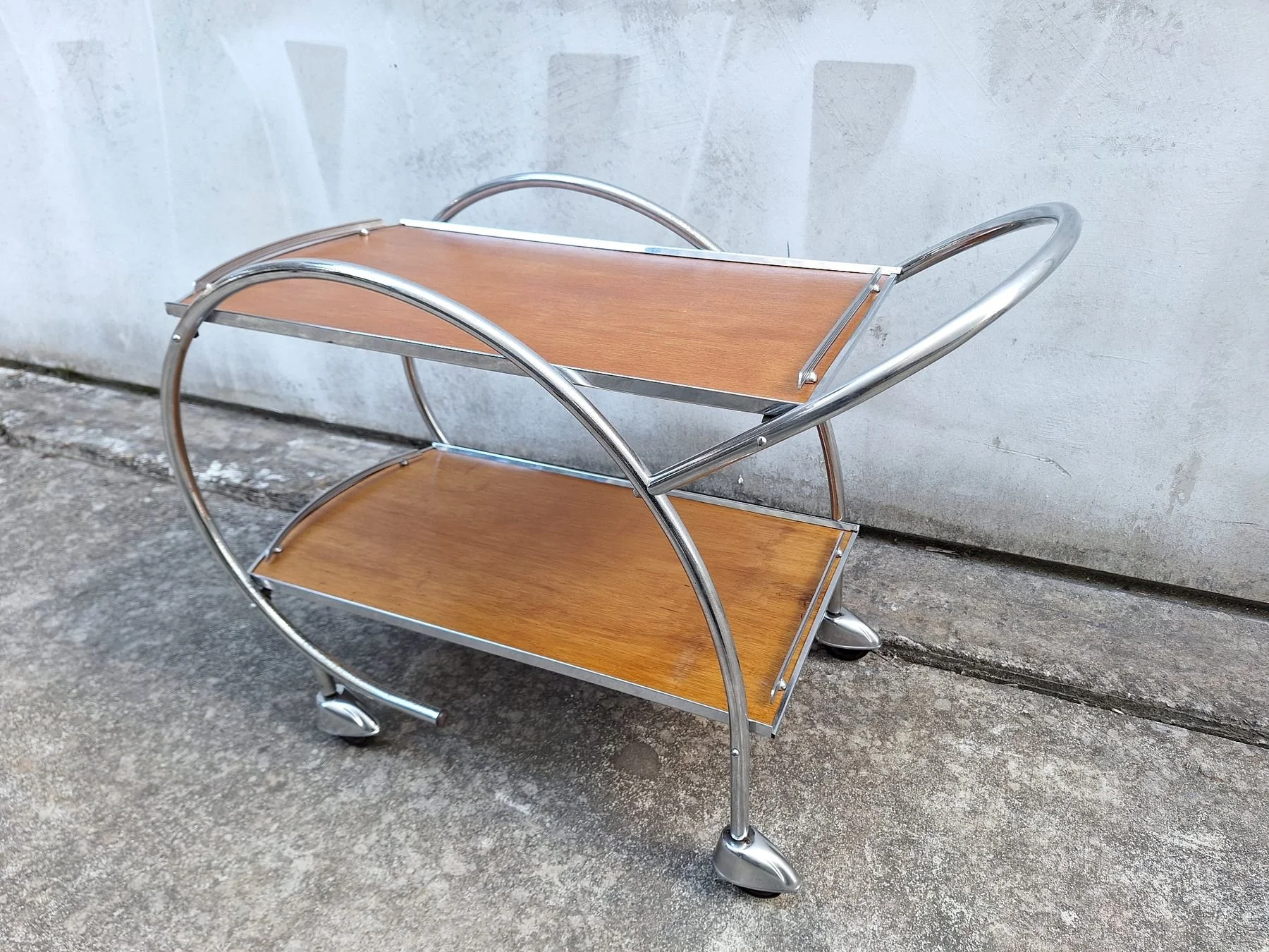 Ranleigh vintage bar cart showing curved handle and two-tier construction