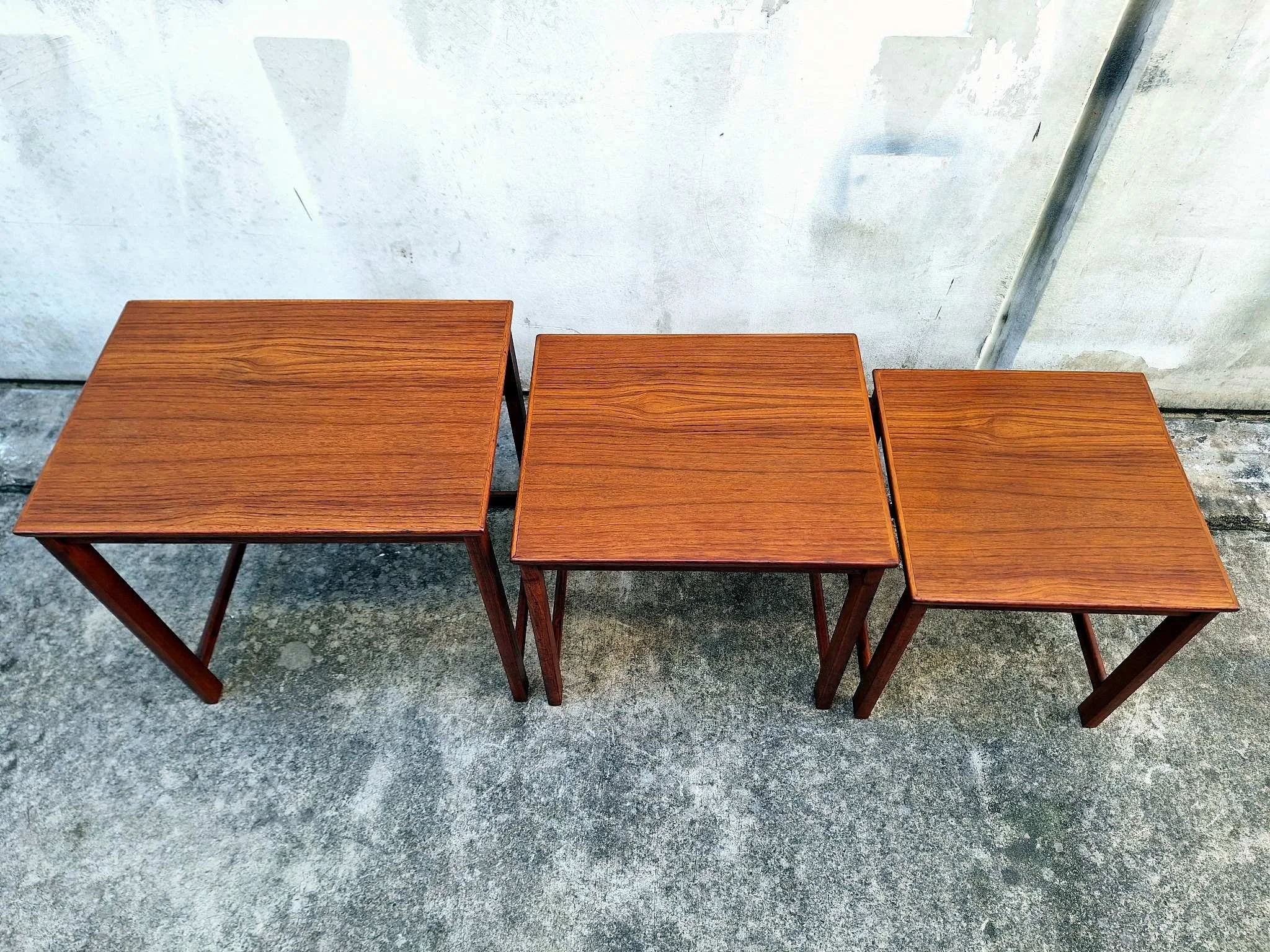 teak nesting tables separated