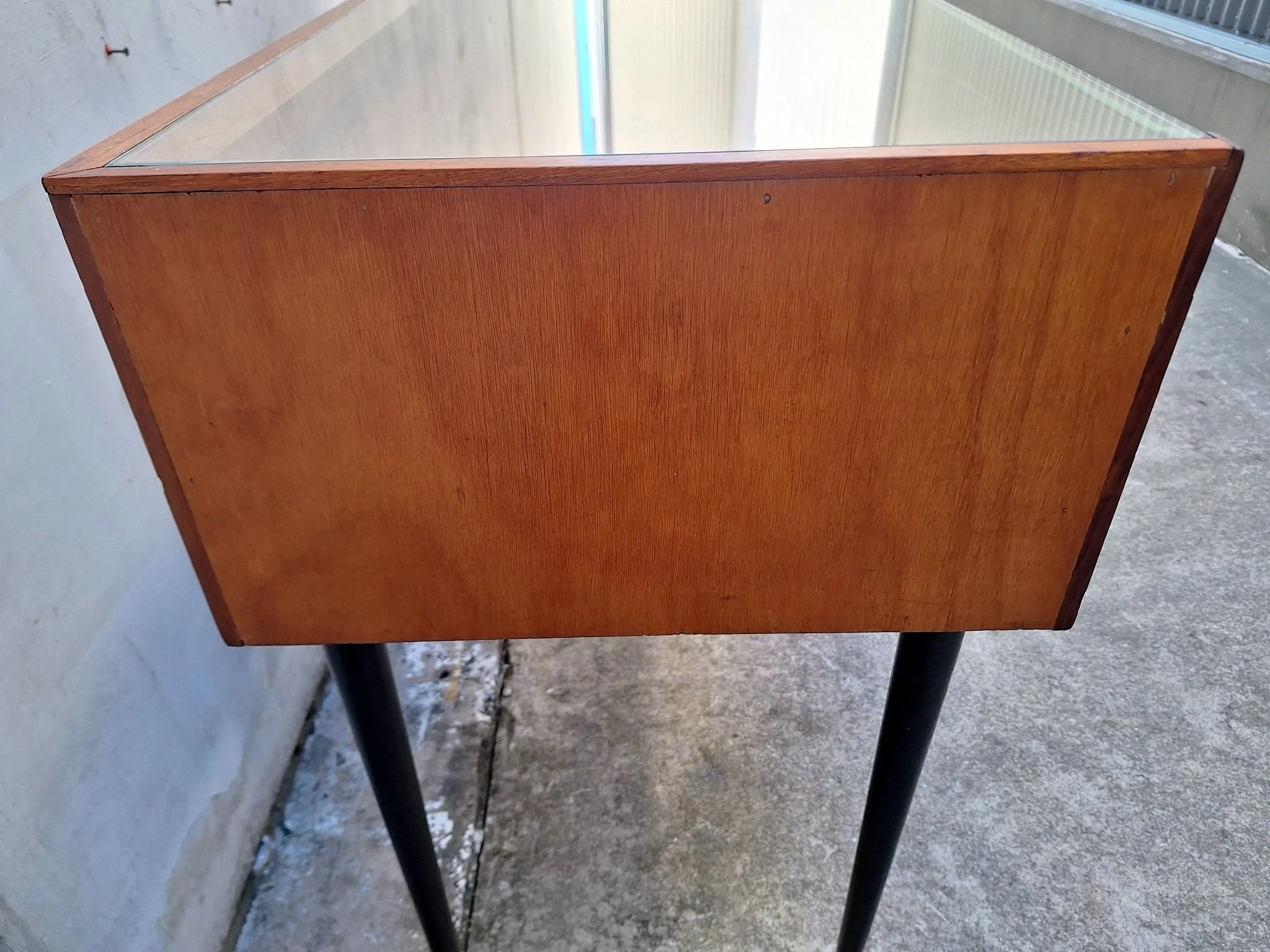 mid-century glass display cabinet side panel