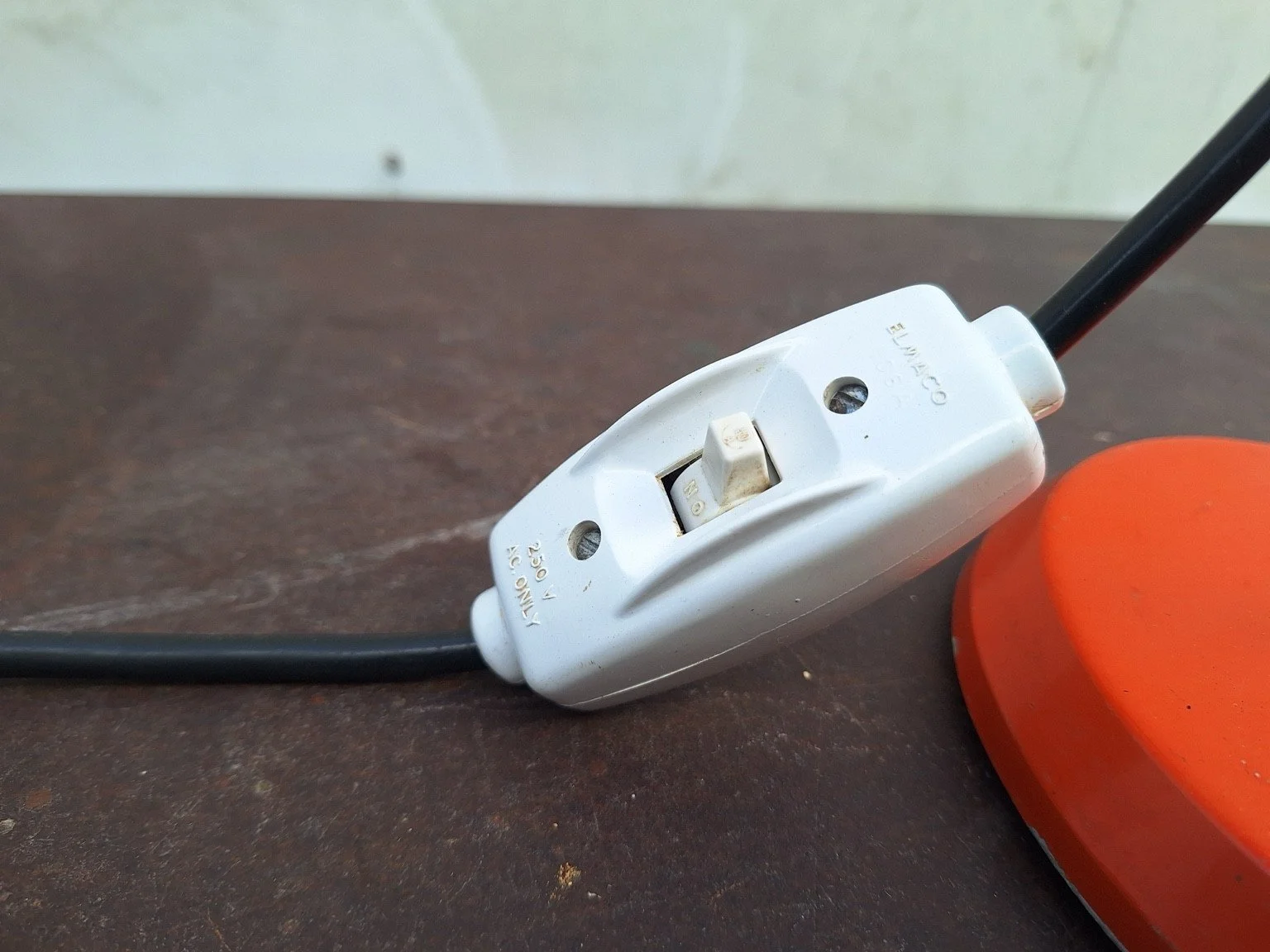 Original inline switch on vintage Oslo orange table lamp