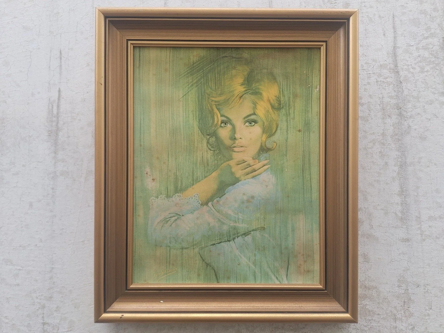 Framed Louis Shabner portrait print of a blonde woman in pale blue against a green background.