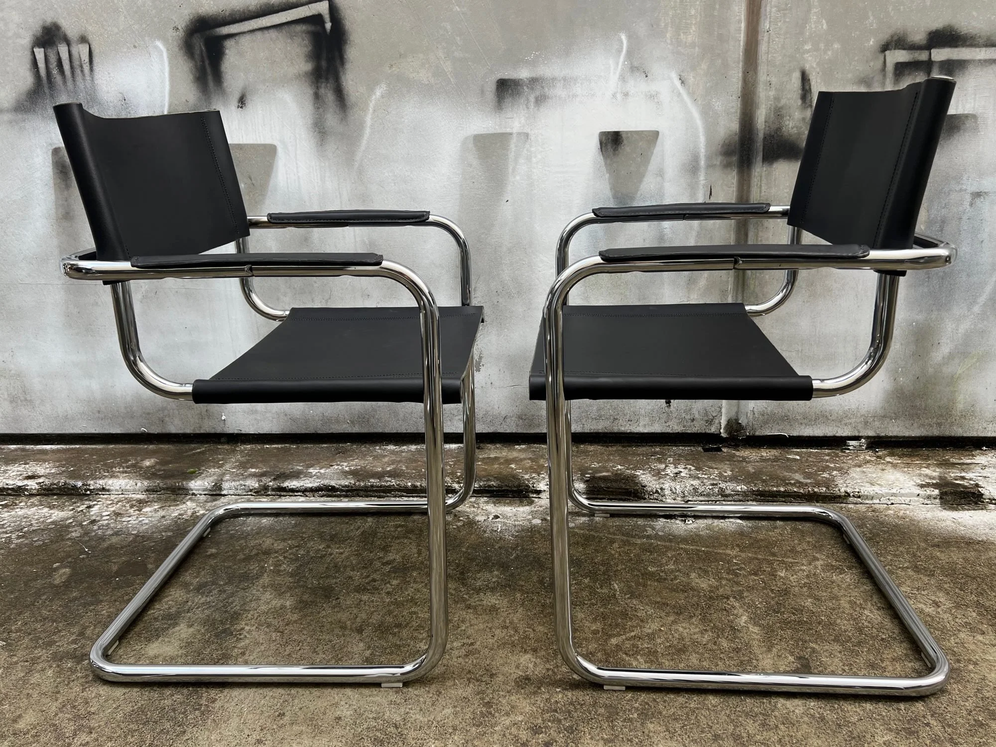 set-of-four-mart-stam-style-cantilever-leather-chairs-4.jpg