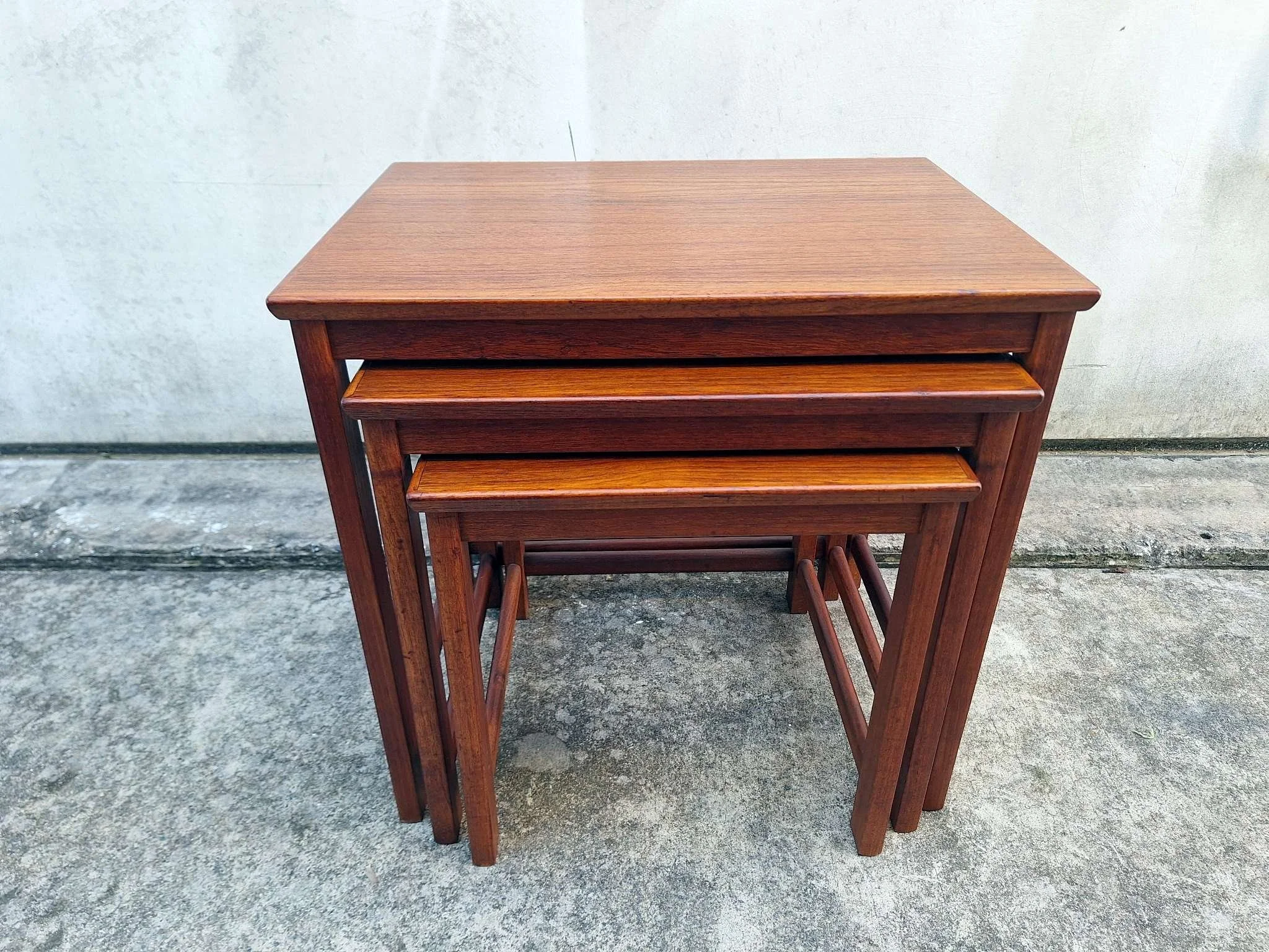 teak nesting tables set front