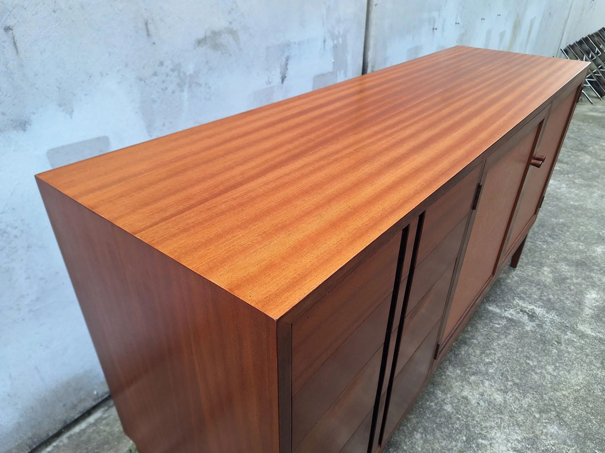 Professionally restored mid century timber sideboard with four drawers, tan vinyl inlay cabinet doors and adjustable shelving.